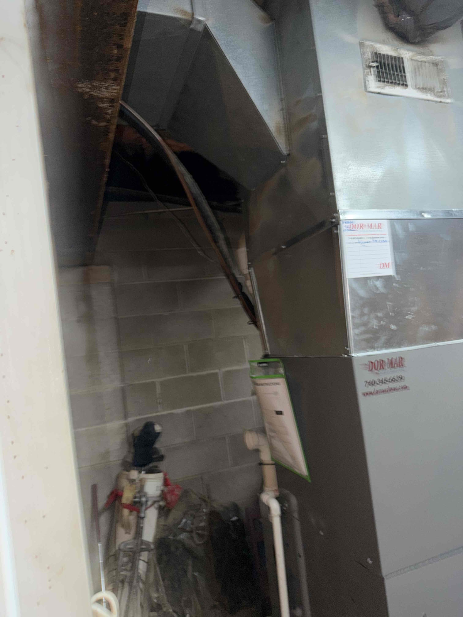 Upon inspection, I discovered that the outdoor drain tube had frozen solid, preventing proper drainage. To address this issue, I first assessed the extent of the freezing and identified the need for a more durable solution. I then returned with vinyl tubing, which is less susceptible to freezing temperatures. The tubing was carefully installed to ensure a secure fit and proper drainage path. This solution will allow the system to drain effectively indoors, safeguarding against future freezing and ensuring the client's system operates smoothly. The installation was completed efficiently, and the client now has a reliable drainage system.