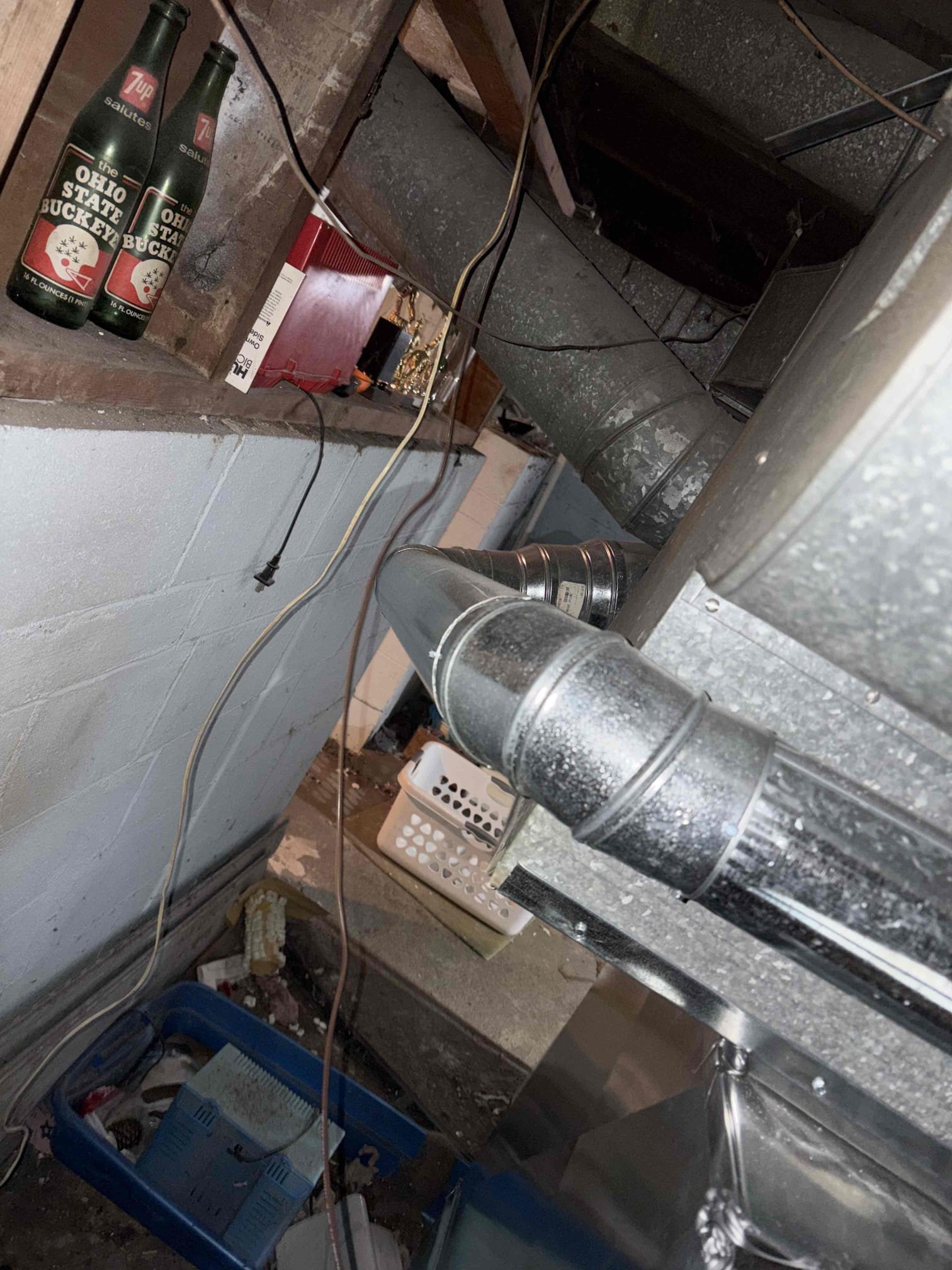 Upon inspection, the heating system installed a year ago was not functioning. Initially, a faulty thermostat was identified, but further examination revealed an improperly angled flue pipe, leading to condensation buildup in the furnace. This condensation had caused the heat exchanger to rust severely. I informed the customer of the necessary replacement of the furnace with a high-efficiency model and ensured proper flue venting. An estimate for the replacement has been emailed to the customer.