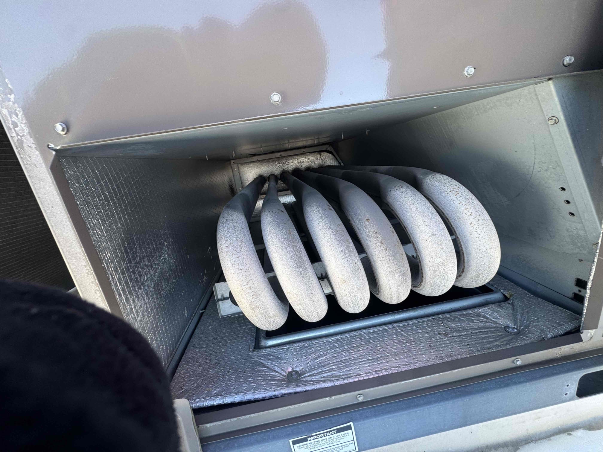 Upon inspection, the filters were severely dirty and obstructed, hindering system performance. I removed the filters and thoroughly cleaned them. Next, I meticulously cleaned the spark ignitor to ensure proper ignition. I then adjusted the manual damper door to optimize airflow. Additionally, I cleaned the flame sensor to enhance its sensitivity and accuracy. After these adjustments, I verified that the systems were functioning correctly and the heating was restored.