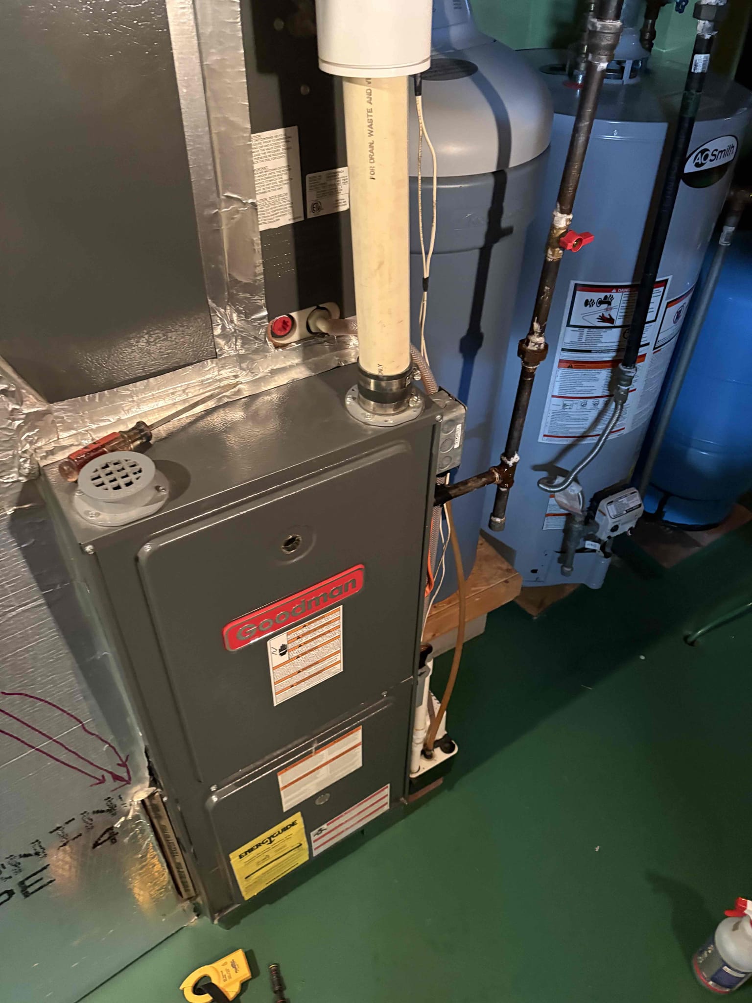 The customer reported a gas smell near the furnace. After discussing with the son, it was confirmed that the gas company had identified a leak leading to the furnace. We tested all connections to the gas valve and found no external leaks. The gas company held a detector near the fresh air intake, which beeped, indicating an internal gas valve leak. We shut off the system and turned off the gas supply until the gas valve can be replaced.