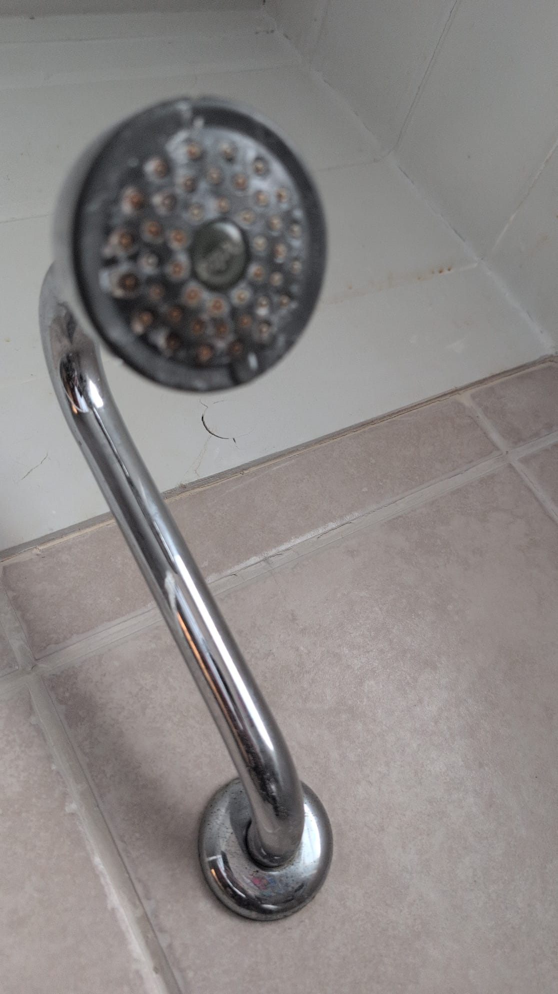 Today, I conducted a thorough plumbing inspection for the client. I examined both full baths, one upstairs and one in the basement. The toilets in both bathrooms functioned perfectly, with no wobbling and no visible leaks at the base or supply lines. The lavatory faucets were also inspected, operating smoothly with no issues and providing adequate hot water. There were no signs of water underneath the cabinetry. Additionally, the showers in both bathrooms turned on and off effortlessly, with no dripping from the shower heads post-inspection. Although I did not flush the water heater, I did inform the client that it is a 20-year-old Sepco 115-gallon electric model installed in 2006.