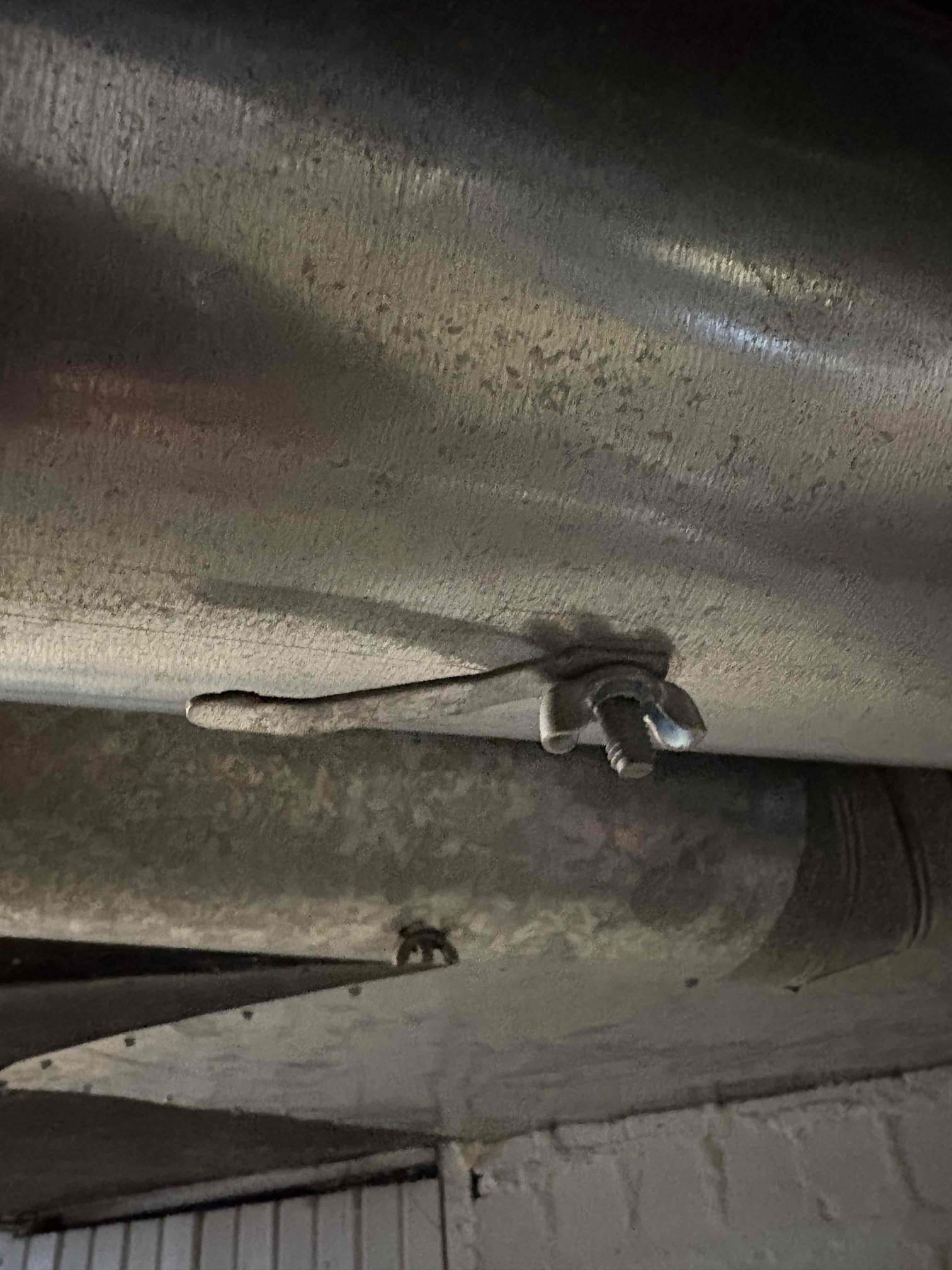 I began by inspecting the dampers to ensure they were fully open, allowing for optimal airflow. Upon discovering that some dampers lacked control levers, I discussed the benefits of installing them with the customer. These levers provide easier manual control and enhance system efficiency. To address this, I placed an order for five damper control levers. This proactive step will improve the system's functionality and ease of use for the customer. The installation of these levers will be scheduled at a convenient time.