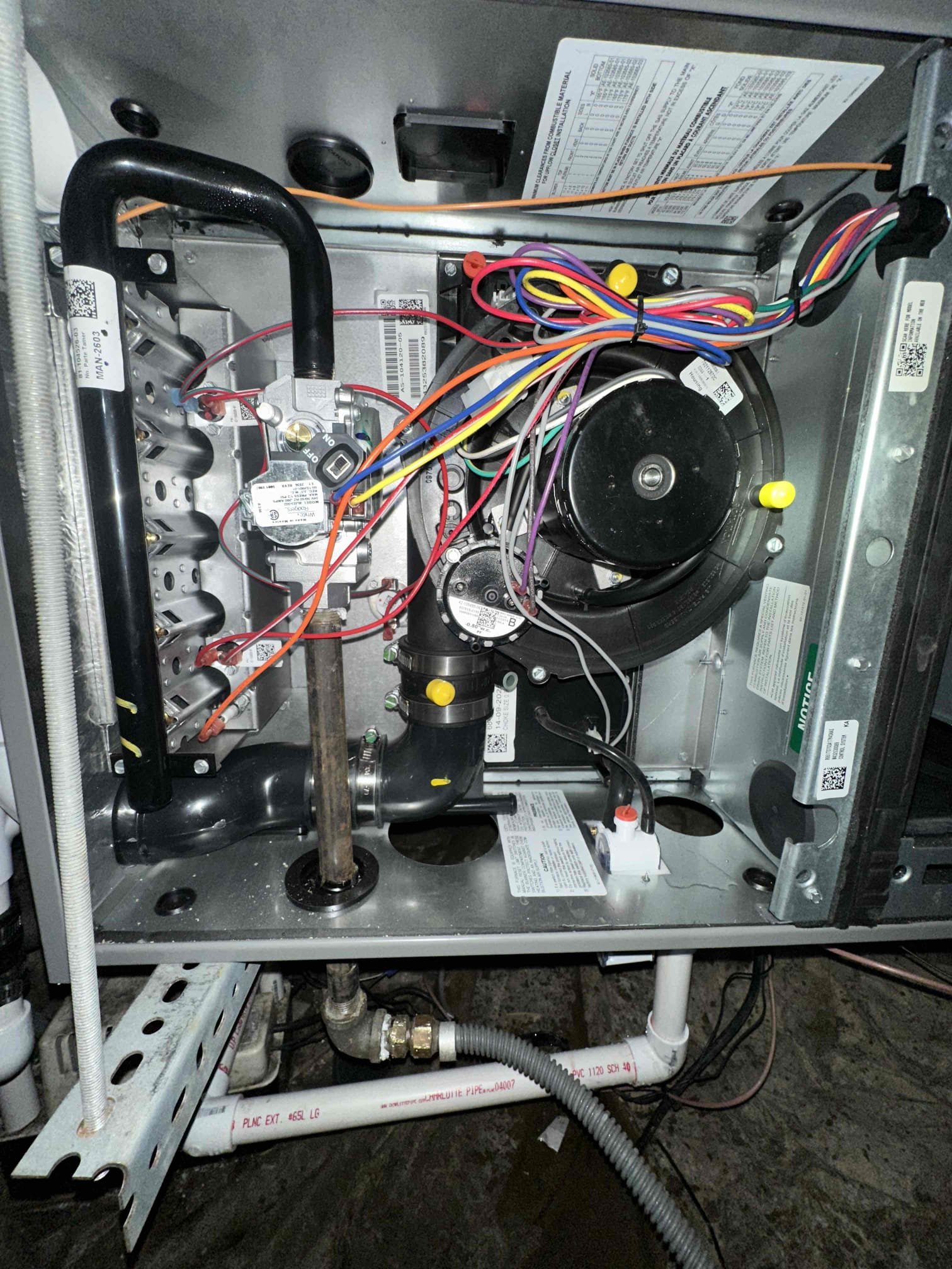 Upon inspection, I found that the inducer of the furnace was accumulating water, which is a critical issue that needs immediate attention. To prevent further damage, I carefully pulled the plug to allow the furnace to release all the collected water. This action ensured that the system could operate safely until the installers arrive to address the root cause. I ensured that the process was handled with precision to avoid any potential hazards. The furnace is now in a stable condition, and the collected water has been safely expelled. This temporary measure will maintain system integrity until the permanent solution is implemented.