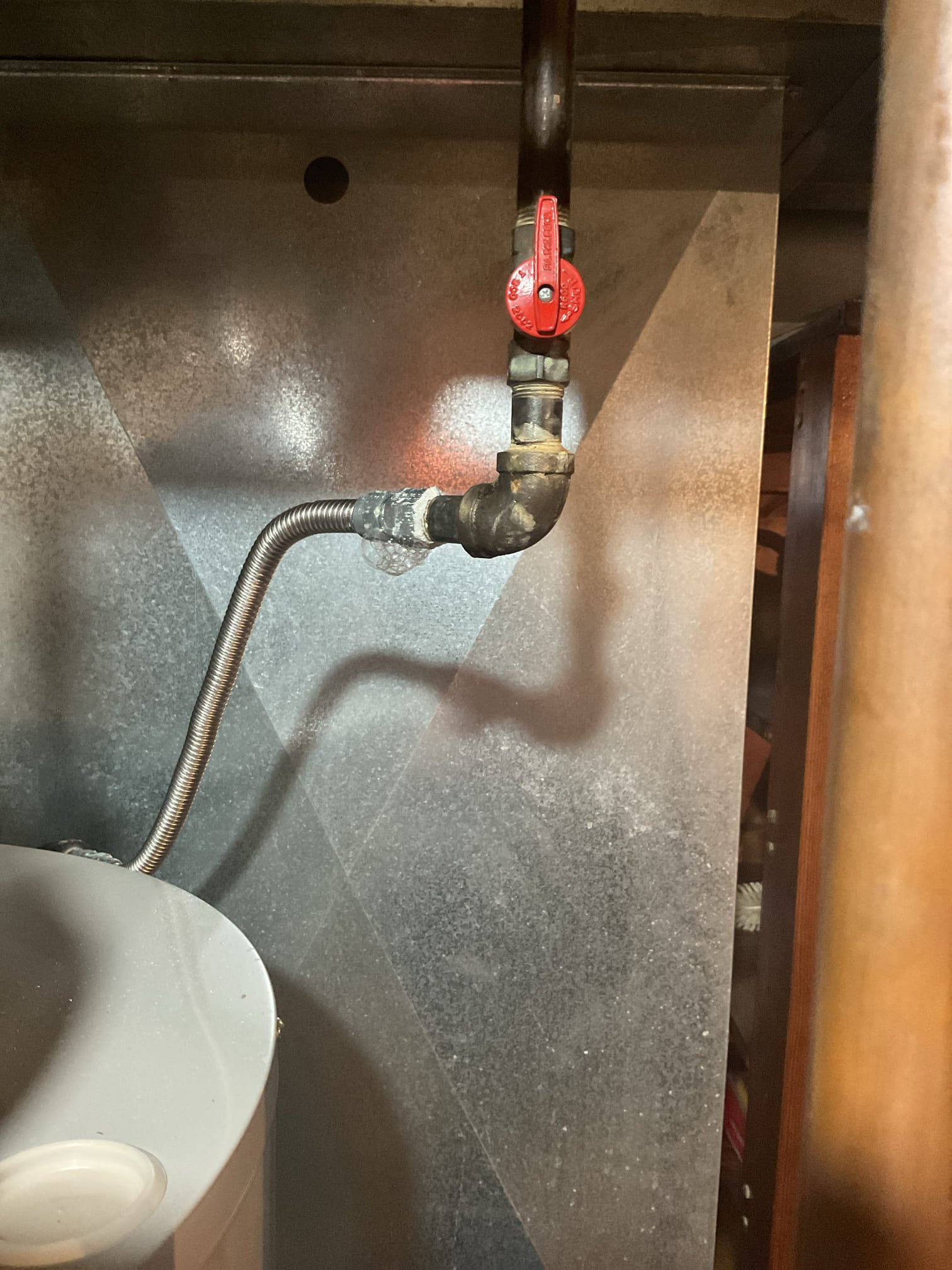 A client contacted us regarding a gas leak near the water heater we installed the previous day. Upon arrival, I used a soap and water solution to create bubbles around the suspected area. This method quickly identified the leak's source. I tightened the affected nut, which successfully stopped the leak. After confirming that the leak was resolved, I ensured everything was secure and functioning properly. The water heater is now safe and operational.