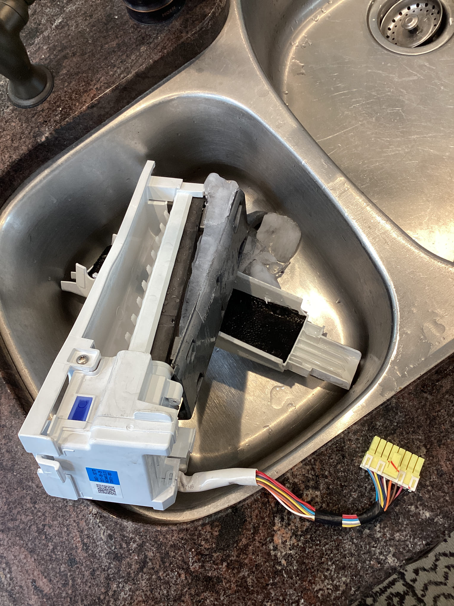 I successfully completed the replacement of the ice maker update kit. This involved carefully removing the old ice maker components and ensuring all connections were properly disconnected. I then installed the new update kit, which included a modern ice maker mechanism designed for improved efficiency and reliability. The new kit was meticulously aligned and secured to ensure it functioned seamlessly with the existing system. After installation, I tested the ice maker to confirm it was producing ice correctly and checked for any leaks or malfunctions. The entire process was completed with precision, ensuring the appliance operates at optimal performance.