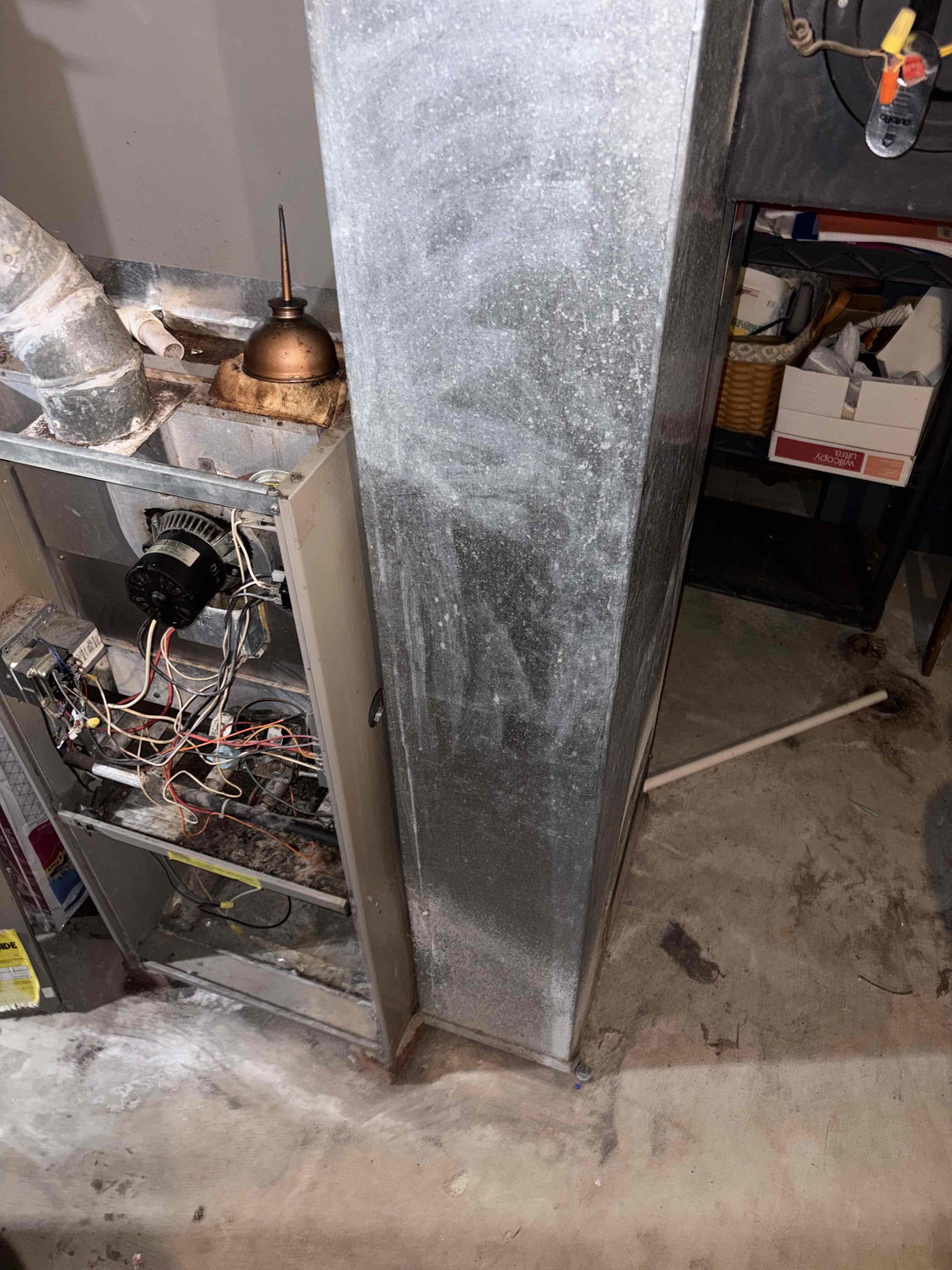 Upon inspection, the unit was not operational. I checked the system and discovered a lack of 24 volts reaching the W wire. By temporarily bypassing the unit, I identified multiple issues during the heating cycle. The furnace module repeatedly clicked the igniter, and the gas valve opened and closed continuously. Removing power from the W wire caused the inducer motor to run indefinitely until I tapped the relay. I found a 5-amp fuse wrapped in aluminum tape, which was completely melted. Burn marks on the connections confirmed a short circuit. I recommended a replacement due to likely compromised parts and the unit's age. I emailed the customer replacement estimates and turned off the power at the breaker.