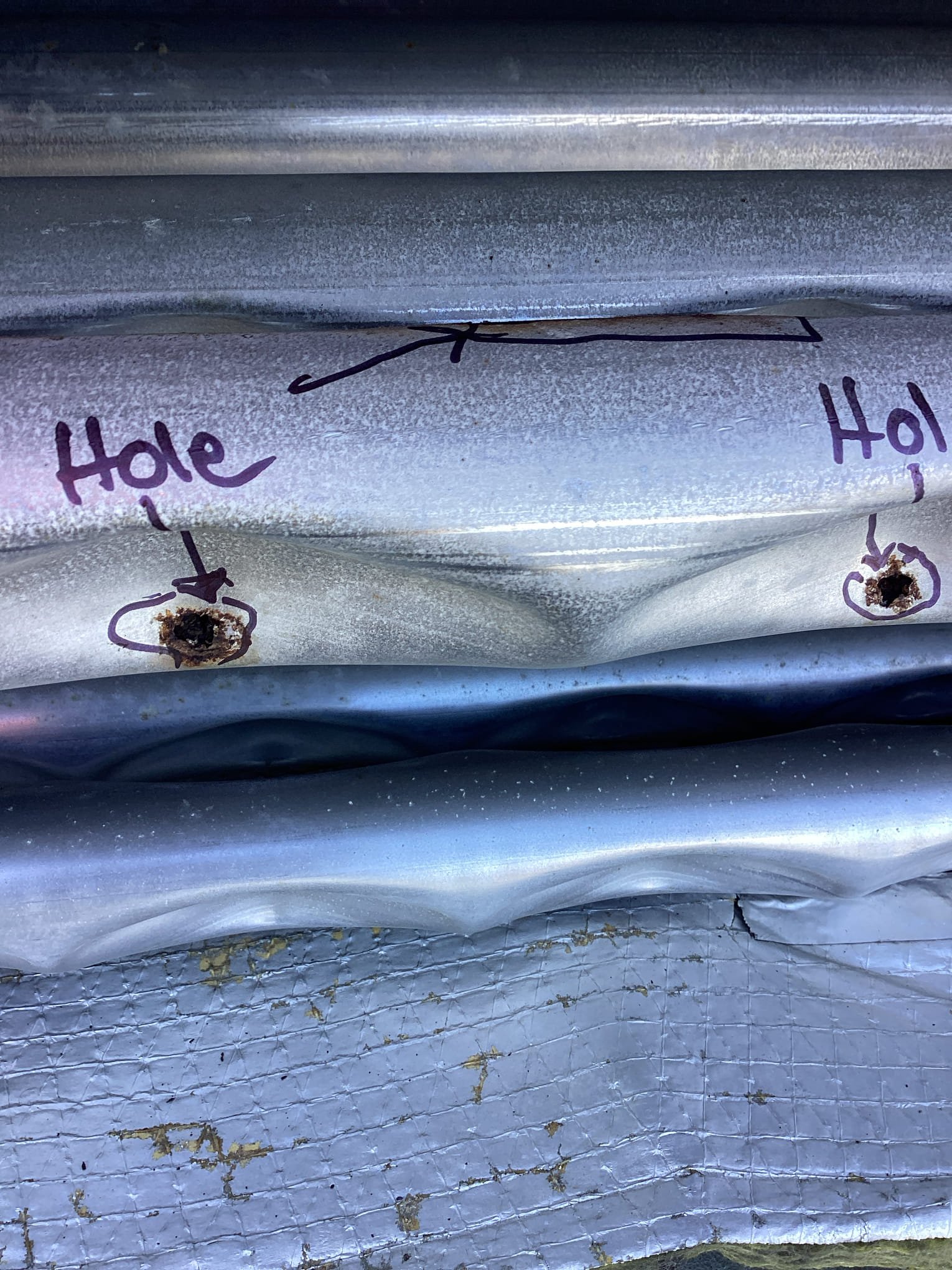 Upon inspection, multiple holes were discovered in the heat exchanger, and the inducer motor was found to be non-functional. Additionally, the support assembly exhibited significant rust, and the flame retainer was compromised. I assessed the situation and provided a detailed estimate for the necessary repairs, including replacement of the heat exchanger, inducer motor, support assembly, and flame retainer to restore the unit's functionality.