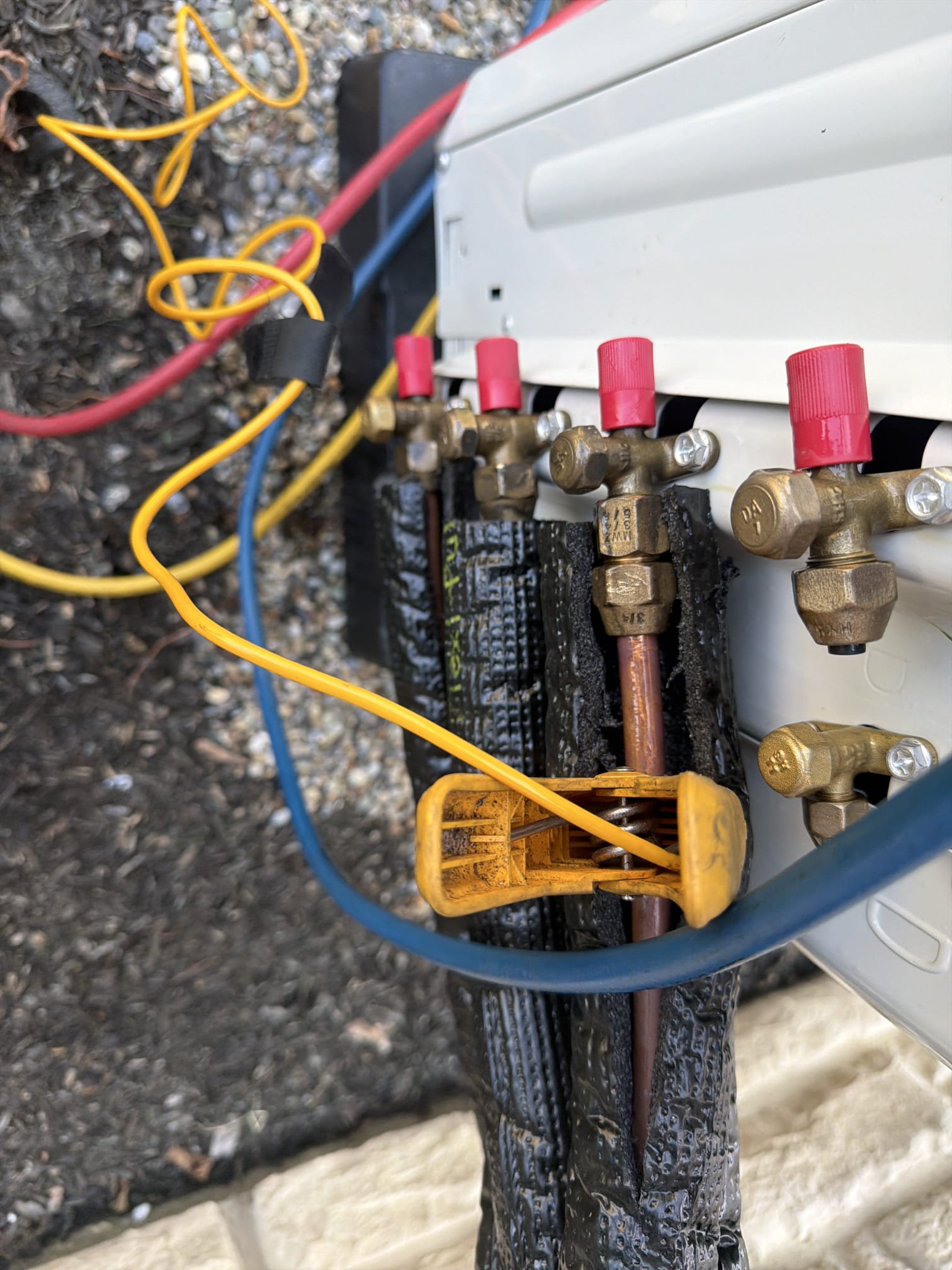 New Albany, OH - Upon inspection, one circuit was completely frozen, extending to the condenser. The system required a thaw before further assessment. After thawing, I checked the refrigerant charge and metering device for proper function. The system was found to be low on refrigerant and completely frozen. I tightened loose flare nuts and valve caps, added 2 pounds of refrigerant, and resolved a leak at the bottom flare. All six filters were cleaned, and the system is now cooling effectively. No charge was applied for the refrigerant.