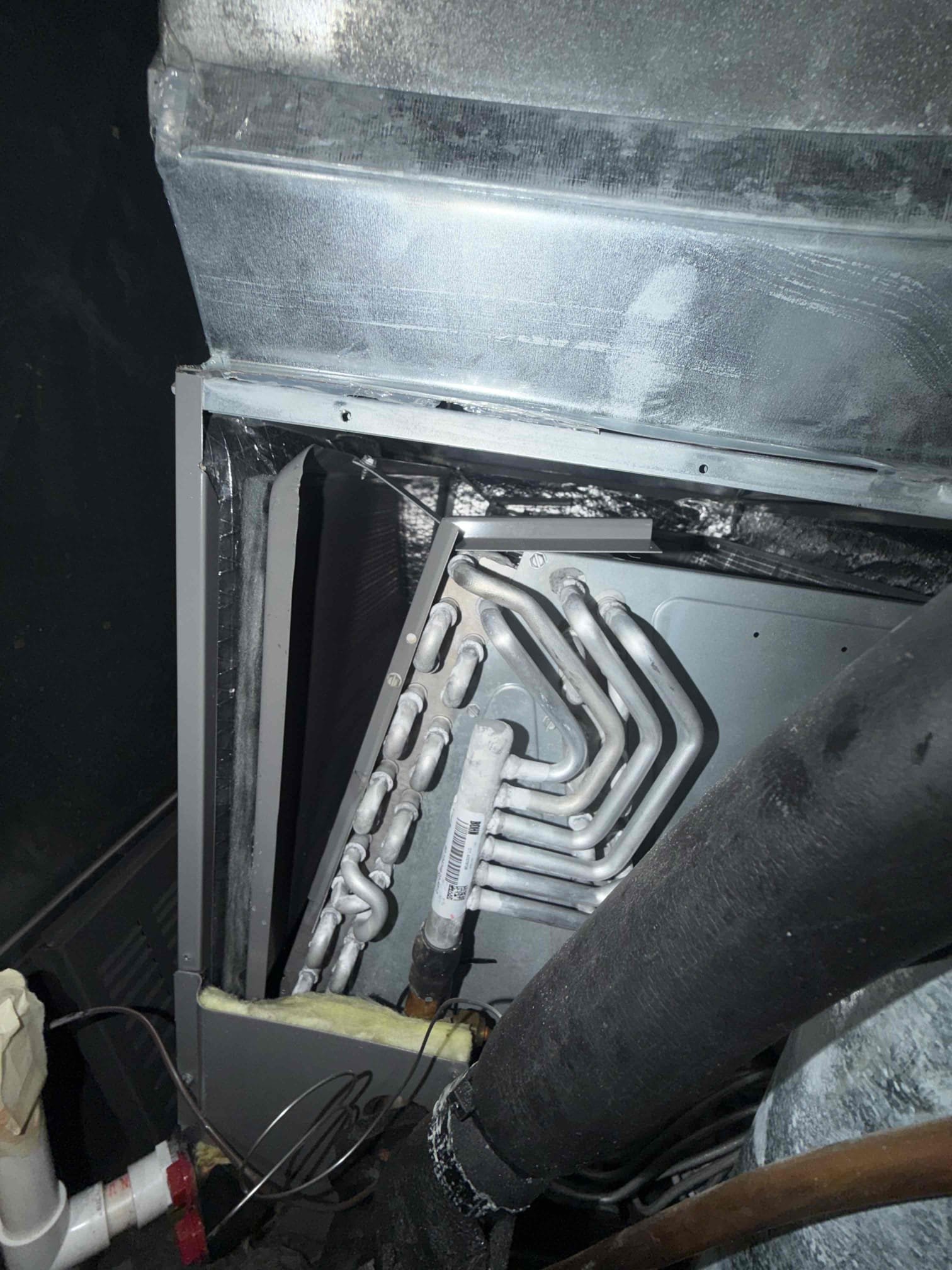 Pataskala, OH - Upon arrival, I identified a significant airflow restriction caused by a piece of cloth caught in the blower wheel. This obstruction impaired the blower’s ability to circulate air, leading to reduced airflow across the evaporator coil. Consequently, the coil temperature dropped below freezing, resulting in ice formation. After removing the obstruction, I inspected the blower wheel and verified proper operation. I also checked refrigerant pressures to ensure the system was within expected parameters. The system was restored to optimal cooling performance before I left.