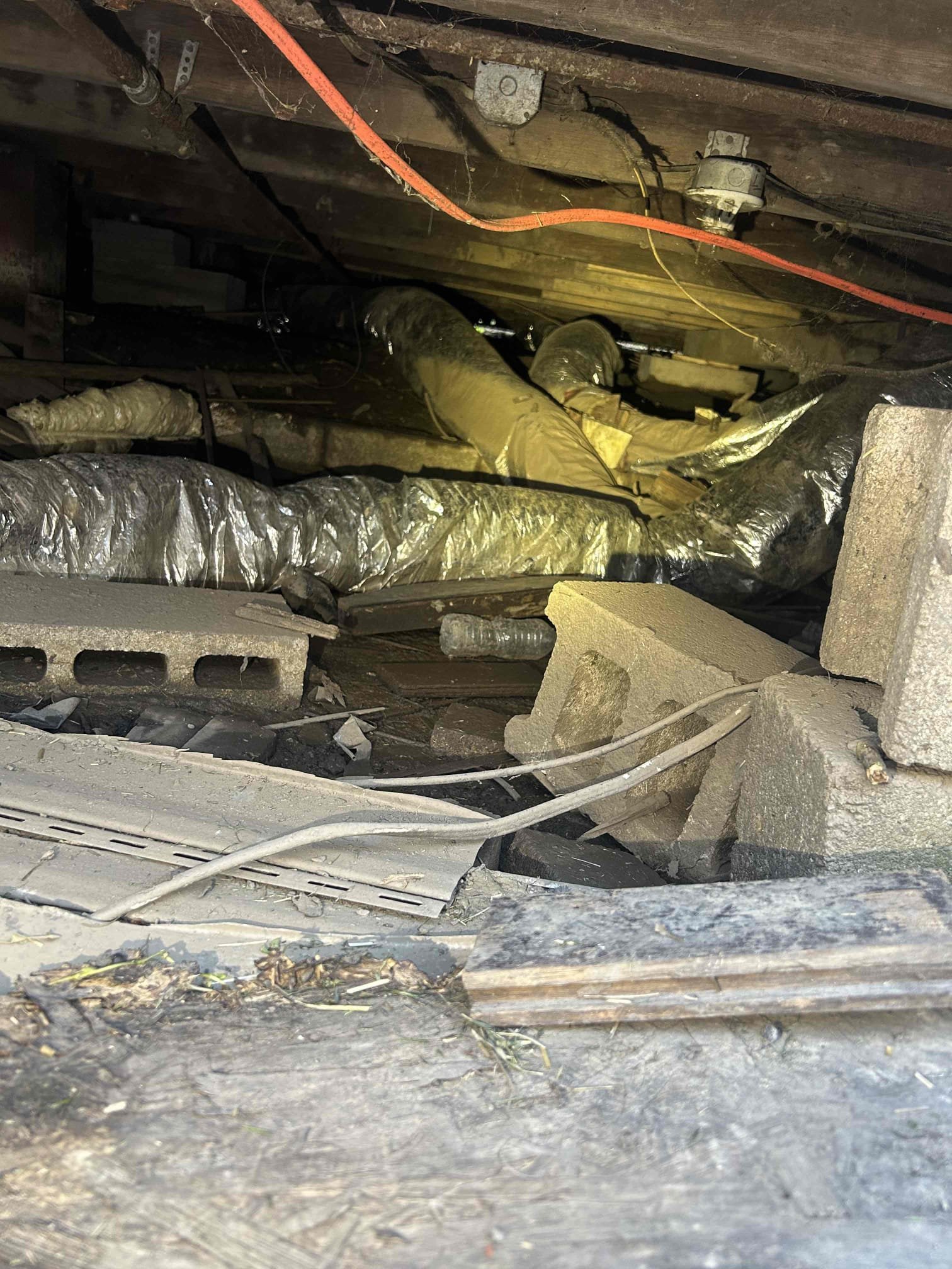 Millersport, OH - During the inspection, extensive damage to flex runs in the crawl space was discovered due to recent flooding. A comprehensive follow-up inspection is required to assess the full extent of the damage and compile a material list for the customer quote. Additionally, two supply runs on the second floor showed no airflow, necessitating a camera inspection behind finished drywall. An estimate for replacing the 6” flex round ductwork has been sent via email.