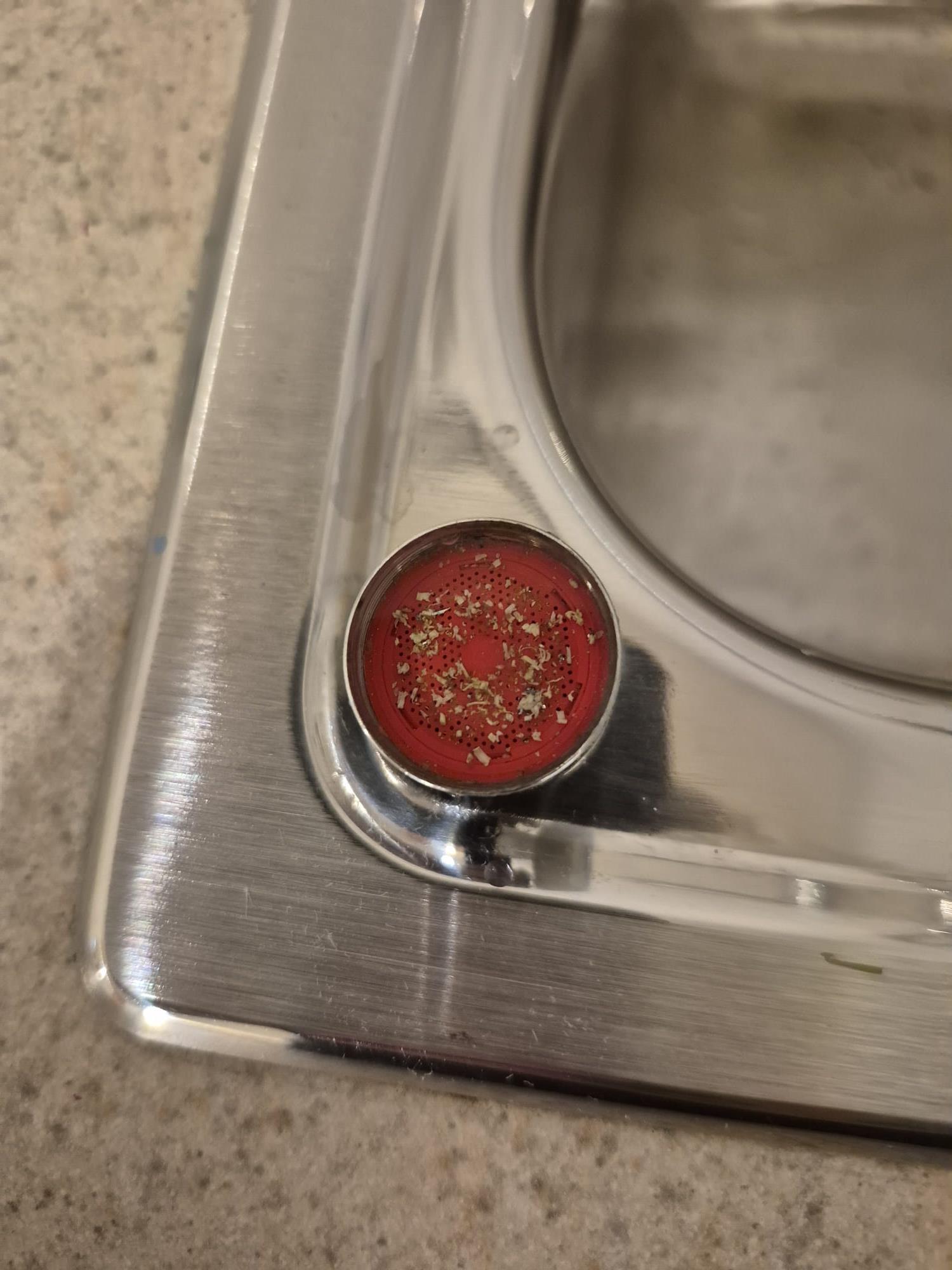 Hilliard, OH - During the plumbing maintenance, I flushed the Rheem tankless water heater, which performed excellently without any issues. I inspected all 2.5 bathrooms, ensuring the Mansfield toilets flushed properly and did not wobble. The vanity sinks had good flow, with no leaks and well-maintained P-traps. The showers and tubs were also checked, with tub spouts functioning well and drains operating smoothly. All valves were Delta, and the radon system was already installed, reading at 0.6.