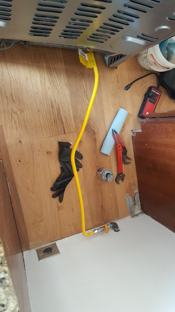 Installing gas line for stove.  Draper