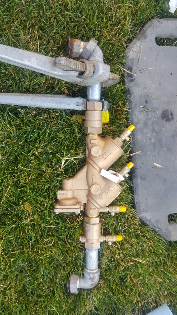 Replacing back flow preventer valve for sprinkler system.  Holladay