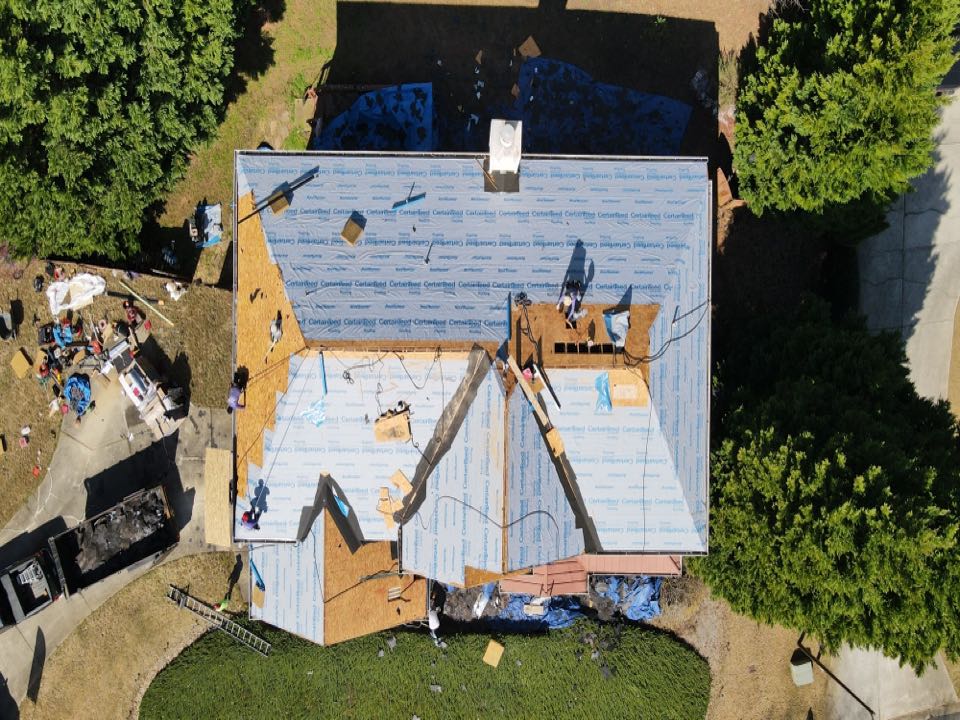 Kennesaw, GA - Kennesaw, off of Stilesboro Rd putting up another brand new roof! Today’s installation is being performed due to hail damage; paid for by homeowner’s insurance. Today we will be using Certainteed products such as the Landmark Weather Blend Shingle, and as always we will be installing Ice & Water shield, drip edge, and replacing any/all rotten boards. This roof will be up to code once we’re done, and the owner will see an increase in property value! Don’t wait, schedule your free inspection ASAP! Kennesaw, GA - Kennesaw, off of Stilesboro Rd putting up another brand new roof! Today’s installation is being performed due to hail damage; paid for by homeowner’s insurance. Today we will be using Certainteed products such as the Landmark Weather Blend Shingle, and as always we will be installing Ice & Water shield, drip edge, and replacing any/all rotten boards. This roof will be up to code once we’re done, and the owner will see an increase in property value! Don’t wait, schedule your free inspection ASAP!