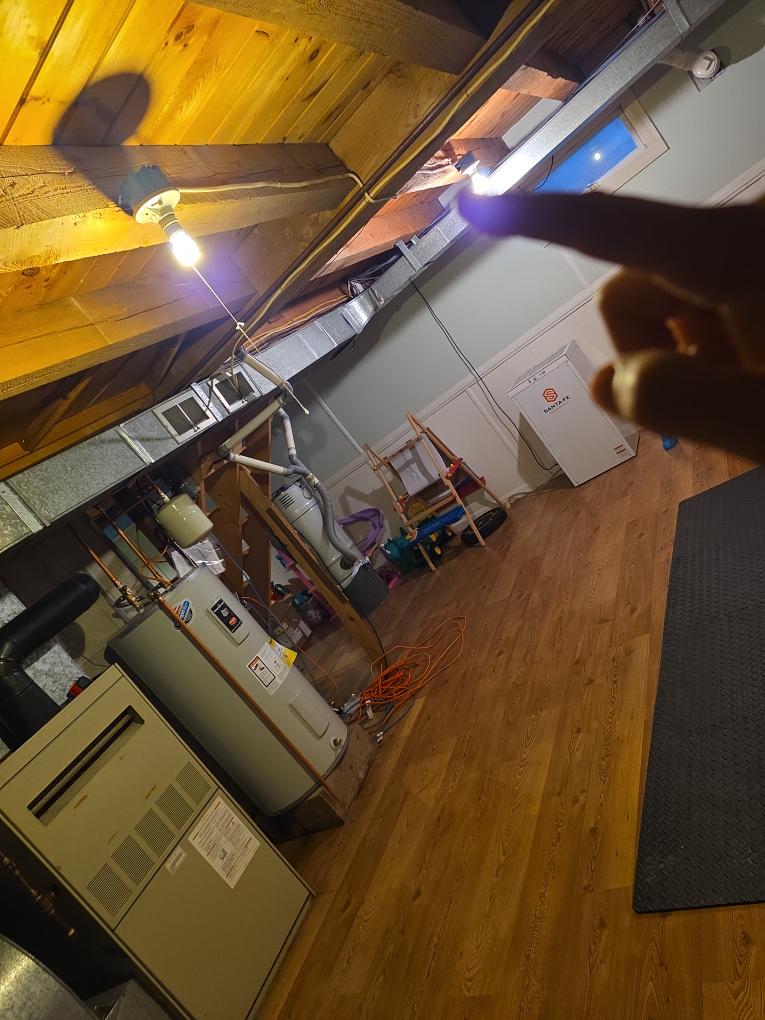 Replacement of the existing 80% gas-fired furnace with a new high-efficiency, 97% efficient, gas-fired direct-vent furnace.

The venting to the chimney will be capped off. New venting, using 2" piping, will exit the front of the home by the basement window, as discussed, to provide both exhaust and fresh air for the new system.

The existing copper gas line will be cut out and replaced with black iron piping back to the transition point. This new section of piping will be sized to meet the load requirements of the new furnace.

A new Lennox S40 thermostat will be installed to provide precise comfort control, as well as air quality monitoring to activate the PureAir system as needed for clean air.

A condensate drain line will be added and will drain through a neutralizer.

A whole-home steam humidifier will be installed for the new furnace. This will require either 120V or 240V circuit installed by the client's electrician.