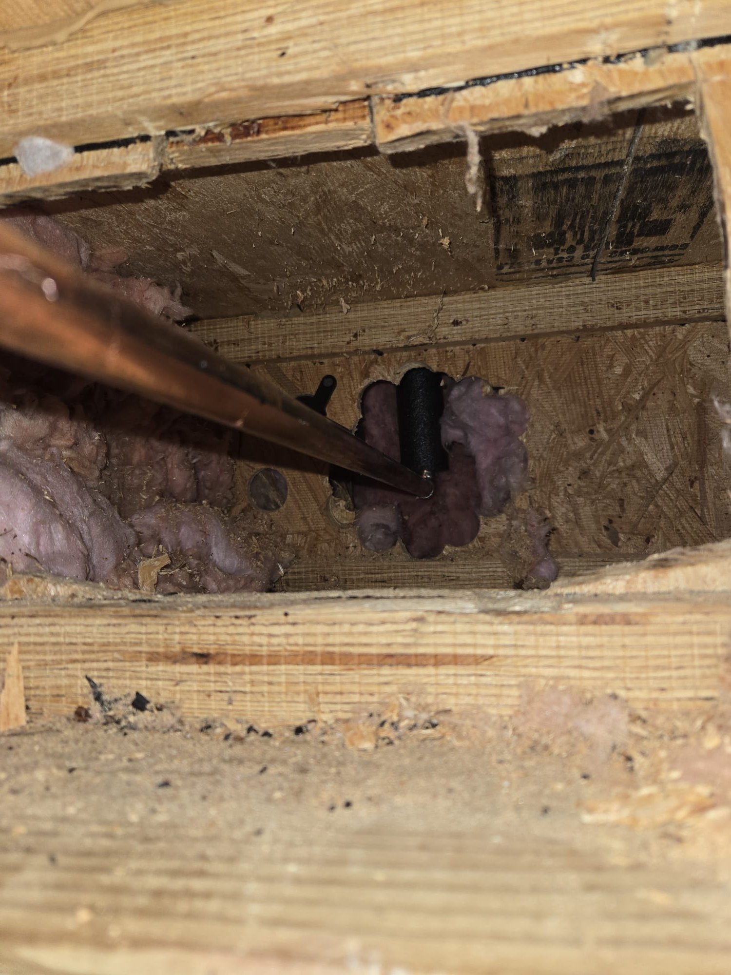 The water pipes that go to the shower valve pass through a floor ontop of a concrete slab. The joist bays are in-fact insulated. I would reccomend putting heat tape on the pipes. I suggest contacting your property management company first. If they will not do it please give us a call. Thank you! 