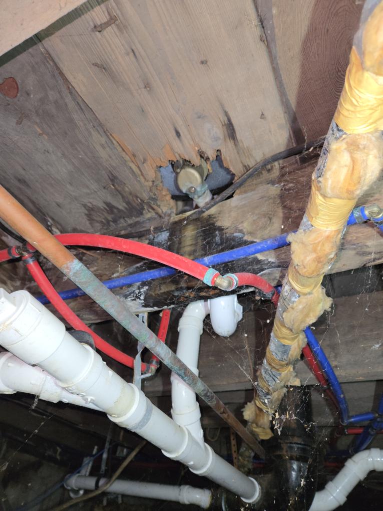 Completed the oil boiler maintenance today. I replaced the nozzle, the pump strainer and the oil filter. I vacuumed out the heat exchanger and the flue pipe. I replaced the leaking high vent and the leaking pressure relief valve. I ran the boiler and performed a combustion analyzer test that checks the units CO, CO2 and oxygen levels. The boiler was running great. No smoke as well. It looks like the first floors tub is leaking, refer to the pictures on the job.
