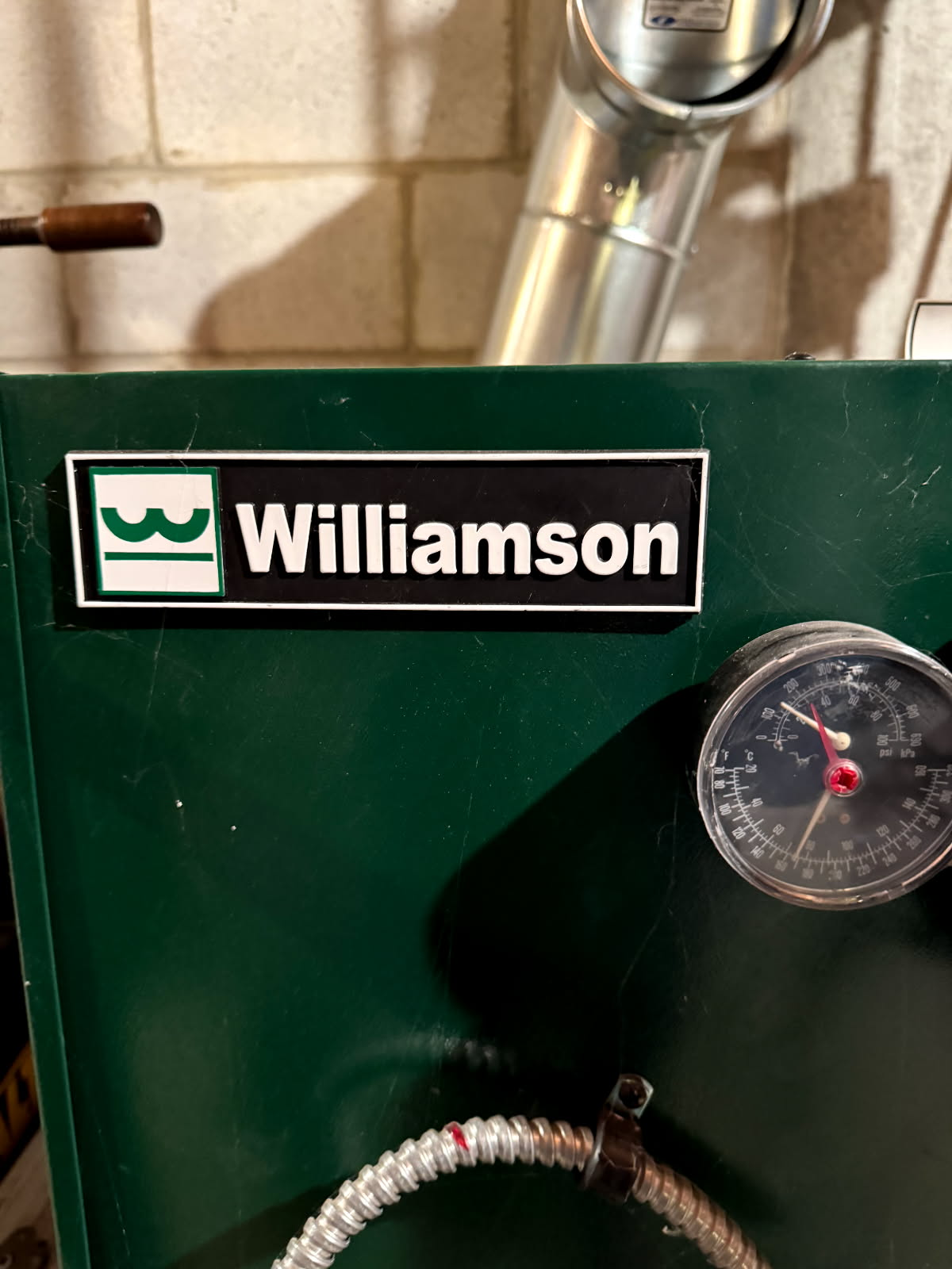 Completed the oil boiler maintenance today. I replaced the oil filter, pump strainer, and the nozzle. I brushed and vacuumed out the heat exchanger. All the boiler accessories looked good. I ran the unit and performed a smoke test and got zero smoke. Lastly I performed a combustion analyzer test that checks the units CO, CO2 and oxygen levels. The boiler was running great. 
