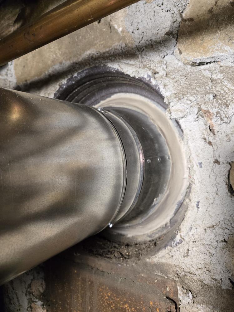 Replace all flue pipe for oil appliances. Test combustion on both pieces of equipment.