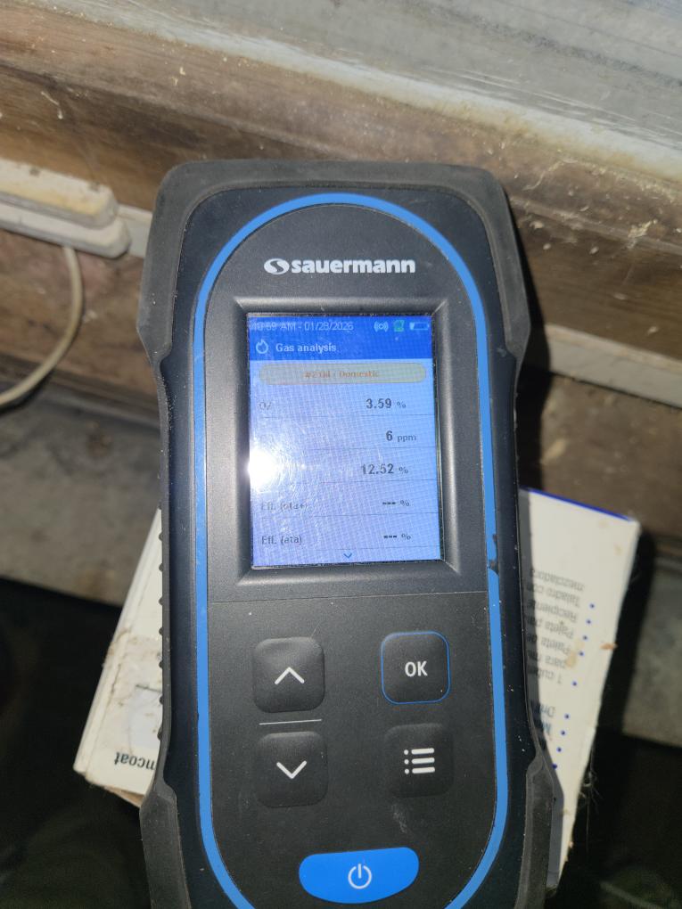 Completed the oil boiler maintenance today. I changed the nozzle, the pump strainer and the oil filter. I found that the expansion tank has failed. I found that the backflow preventer has failed and is leaking water on the ground. I brushed and vacuumed the heat exchanger. I ran the unit and performed a smoke test and got zero smoke. I performed a combustion analyzer test that checks the units CO, CO2 and oxygen levels and the boiler was running great. I replaced the whole house filter. I found a couple wires loose on the zone panel so that's why I believe the thermostats are being iffy. If this problem continues to exist then it could either be the zone panel or the circulator pump. The thermostat in the living room I sealed up the hole that the wire comes through because there's a draft coming through the wall making it sense lower than what it actually is. The client would like us to take a look at her shower. Whenever it is ran it leaks water out the bottom of it. I will send over 