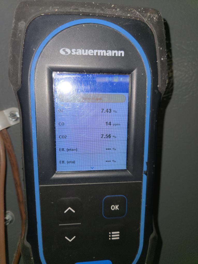 I found that the collector box gasket had failed. I replaced the collector box, collector box gasket and inducer gasket. After I assembled it I ran the unit and checked for leaks and there was none. Lastly I performed a combustion analyzer test that checks the units CO, CO2 and oxygen levels and the furnace was running great.