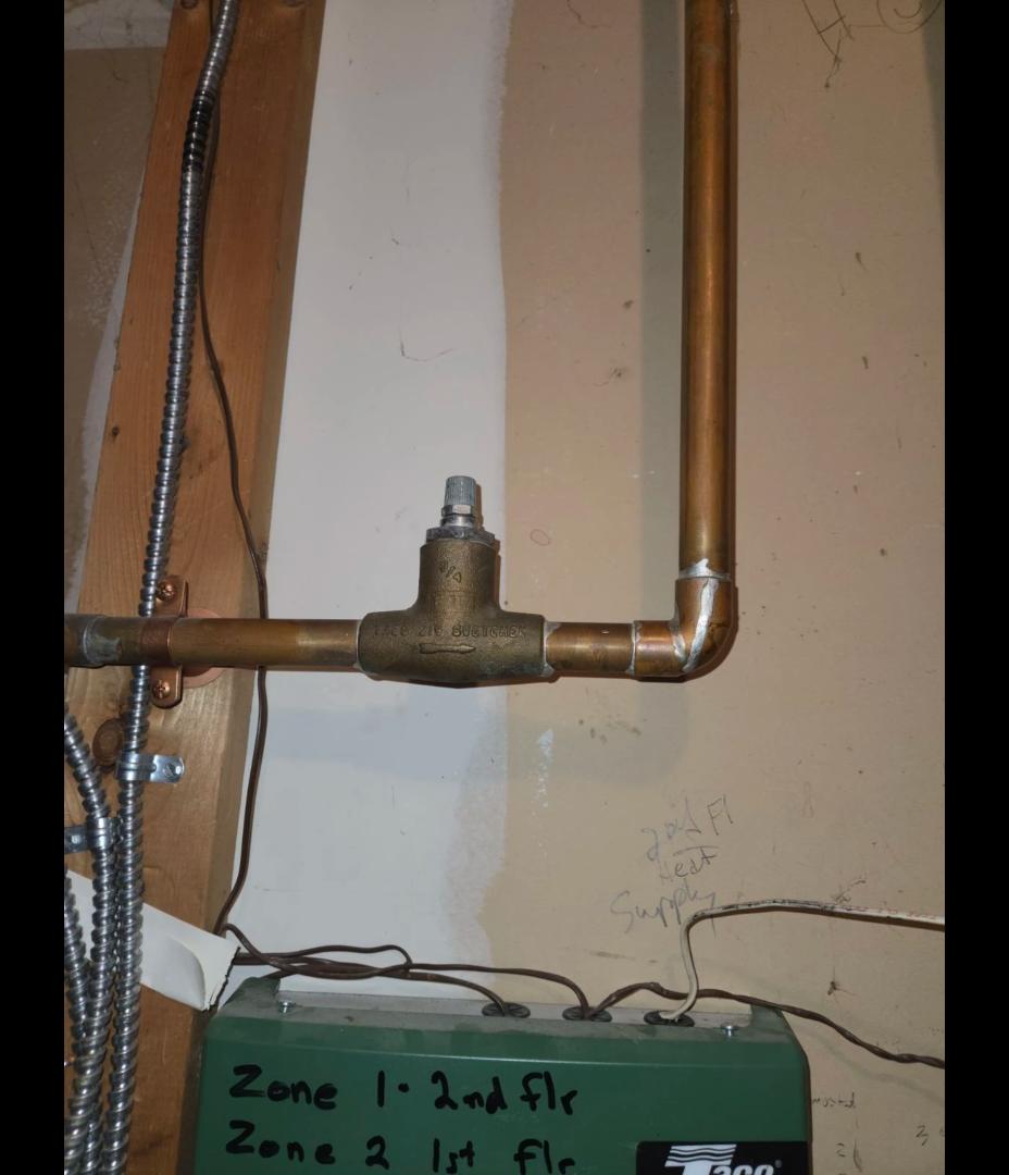 I replaced the faulty flow check today. I insured there was no leaks. I ran the system and made sure the return came back hot.