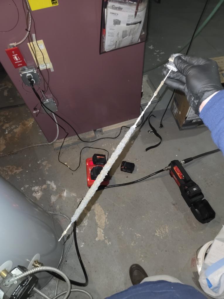 Completed the oil fired water heater maintenance today. I started off with replacing the oil filter, the nozzle, and the pump strainer. Next I drained down the tank. I pulled out the anode rod and it was almost completely gone. After filling the water heater back up I ran the burner. I performed a combustion analyzer test that checks the unit CO, CO2 and oxygen levels and it was running great. I also performed a smoke test and got zero smoke. I noticed that one of the connections going towards the circulator pump is corroded and starting to drip water so I will add that to the estimate. The slop sink in the garage is leaking water from the hose connection that attaches to the handle so those will need to be replaced. 