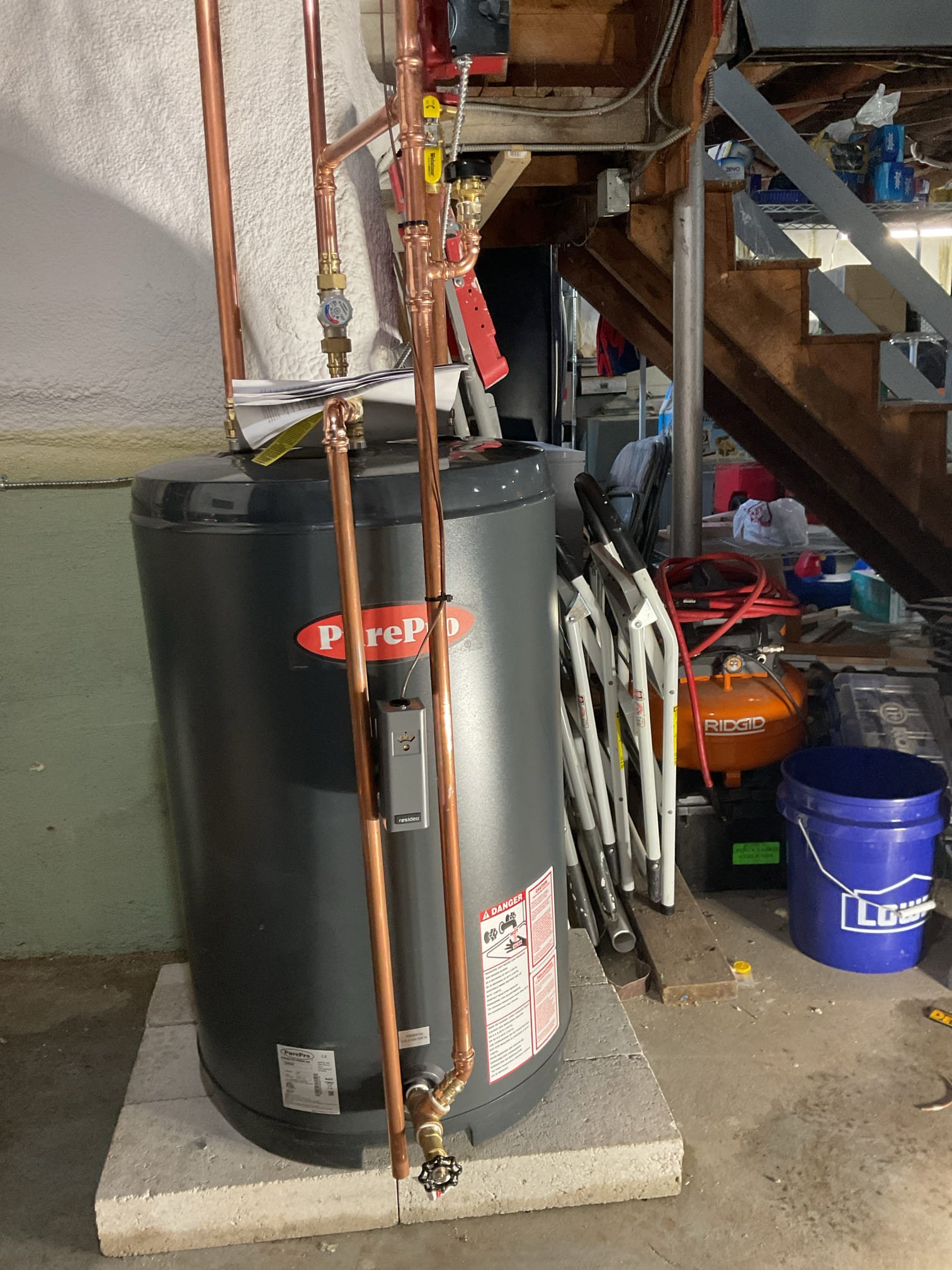 Replacement of the existing tank-style water heater. Install a 40-gallon indirect tank as a new zone off the existing boiler. The boiler was prepiped and set up to allow for this plan in the future.