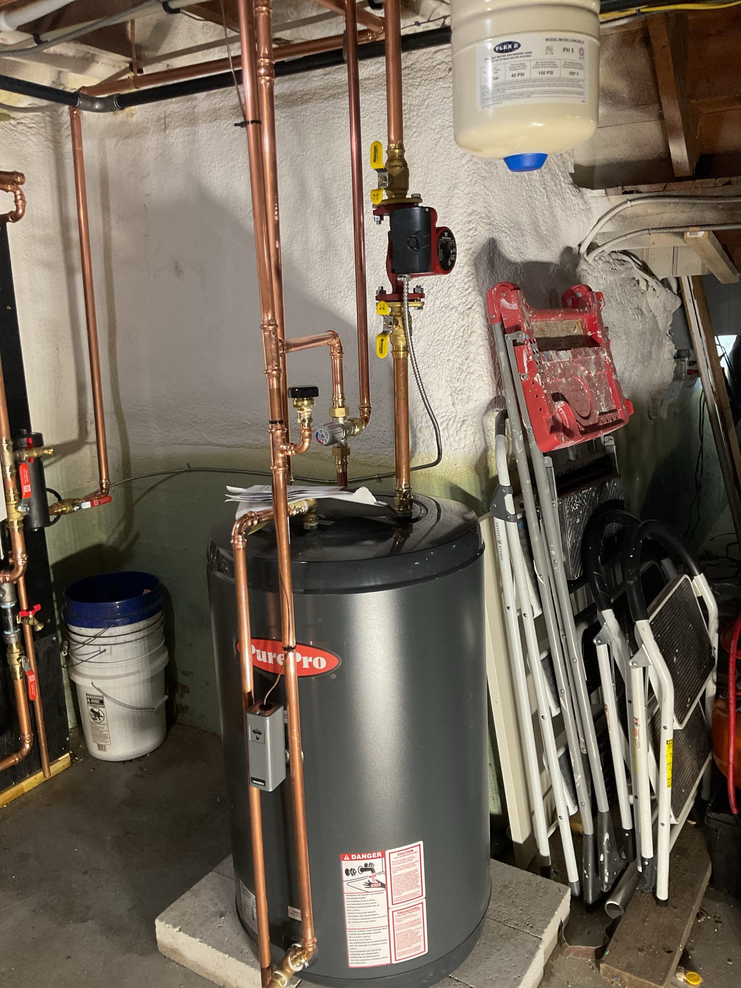 Replacement of the existing tank-style water heater. Install a 40-gallon indirect tank as a new zone off the existing boiler. The boiler was prepiped and set up to allow for this plan in the future.