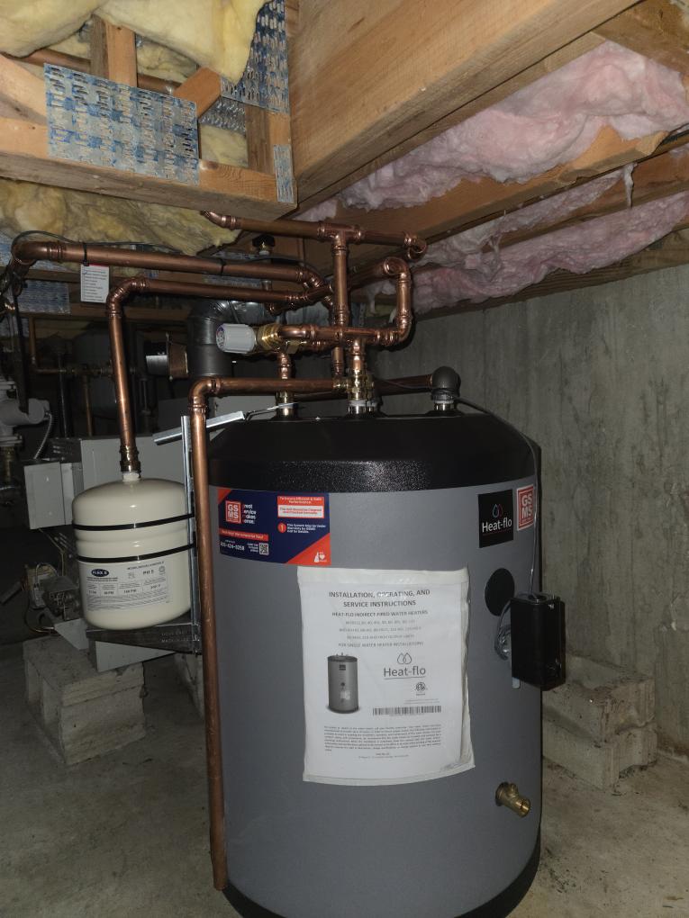 Replaced the failed indirect water tank. Checked for leaks and there was none. Replaced the domestic water expansion tank. Completed the maintenance on the boiler. I started off with checking all the wiring connections and everything looked good. Next I pulled the flame sensor and cleaned it. I vacuumed out the burners and the burner box. I checked incoming and outgoing gas pressure and those were accordance to manufacturer specifications. I inspected all the boiler accessories and the only thing that I found was that the high vent was leaking water. Lastly I ran the unit and performed a combustion analyzer test. This checks the unit CO, CO2 and oxygen levels. The boiler was running good. I bled the air from the hot and cold water lines before I left.