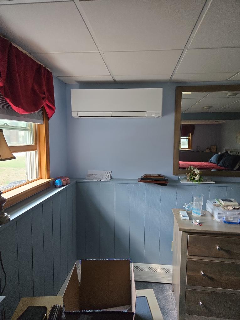 This proposal outlines the installation of high-efficiency 4-Zone Mitsubishi ductless mini-split system. This system is engineered to provide perfectly zoned, independent summer cooling, as well as highly efficient supplemental heating during the shoulder seasons for both the upstairs and basement living spaces.

Scope of Work

1. Outdoor Equipment Installation

Condenser Placement: Supply and install one (1) Mitsubishi 4-Zone outdoor heat pump condenser. The unit will be professionally mounted on the exterior gable end of the home, located to the right of the existing electrical meter.

2. Indoor Air Distribution (4 Wall-Mounted Units)

Supply and install four (4) precisely sized Mitsubishi wall-mounted ductless air handlers in the following dedicated zones:

Zone 1: Basement Living Room: Mounted on the entry wall adjacent to the electrical panel for optimal airflow distribution across the living space.

Zone 2: Basement Bedroom: Strategically mounted on the back wall near the right r