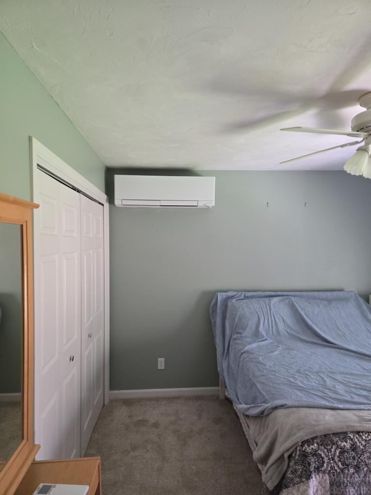 This is our highly recommended design utilizing premium Mitsubishi equipment. It utilizes the exact same second-floor layout and standard heat pump capabilities as Design 1, but upgrades the third-floor unit to a low-profile Floor-Mounted Console. Given the specific dimensions and ceiling angles of your third floor, this option provides the absolute cleanest aesthetic and optimal airflow.

Scope of Work

1. Indoor Equipment (Third Floor - Floor Mount)

Third Floor Space: Install one (1) Mitsubishi Floor-Mounted ductless console.

Layout Adjustment: As we discussed during our consultation, utilizing this floor-mounted unit will require a minor rearrangement of the craft table furniture, but it guarantees the most unobtrusive and visually pleasing installation for this unique space. The exterior lines will drop down to meet the second-floor lines in a "T" and run horizontally along the roofline.

2. Indoor Equipment (Second Floor)

Back Guest Bedroom: Install one (1) Mitsubishi wall-moun