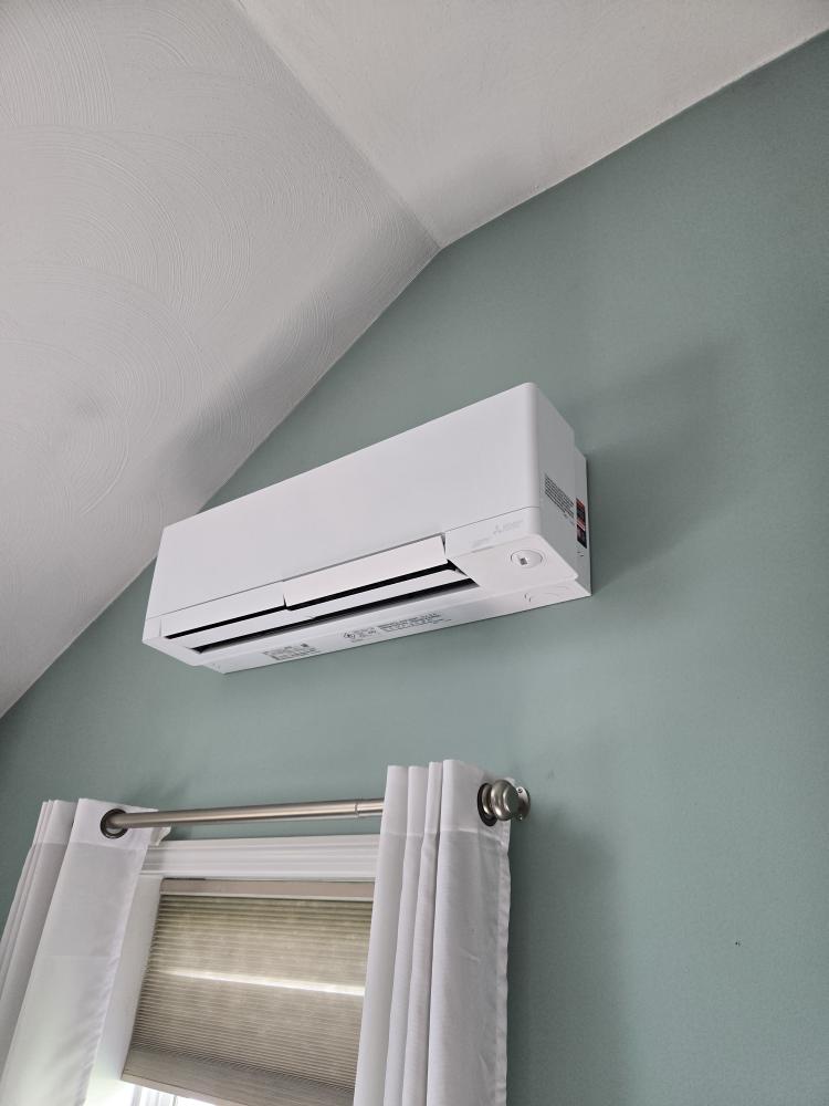 This proposal outlines the installation of a premium 5-Zone Mitsubishi heat pump system. To honor your request of having only one outdoor unit while properly serving all three levels of the home (basement, first floor, and second floor), we have upgraded the design to utilize Mitsubishi’s advanced Smart Multi system. This commercial-grade technology uses a centralized "Branch Box" distribution method, allowing us to run the extended refrigerant line lengths required for this specific floor plan while strictly adhering to manufacturer engineering specifications.

Scope of Work

1. Outdoor Equipment & Distribution

Condenser Placement: Supply and install one (1) Mitsubishi Smart Multi outdoor heat pump condenser. The unit will be located on the gable end of the home (garage side), neatly tucked into the corner where the chimney jogs out.

Attic Branch Box: Install the required Mitsubishi Branch Box up in the attic space. The main refrigerant trunk line will route from the outdoor unit up