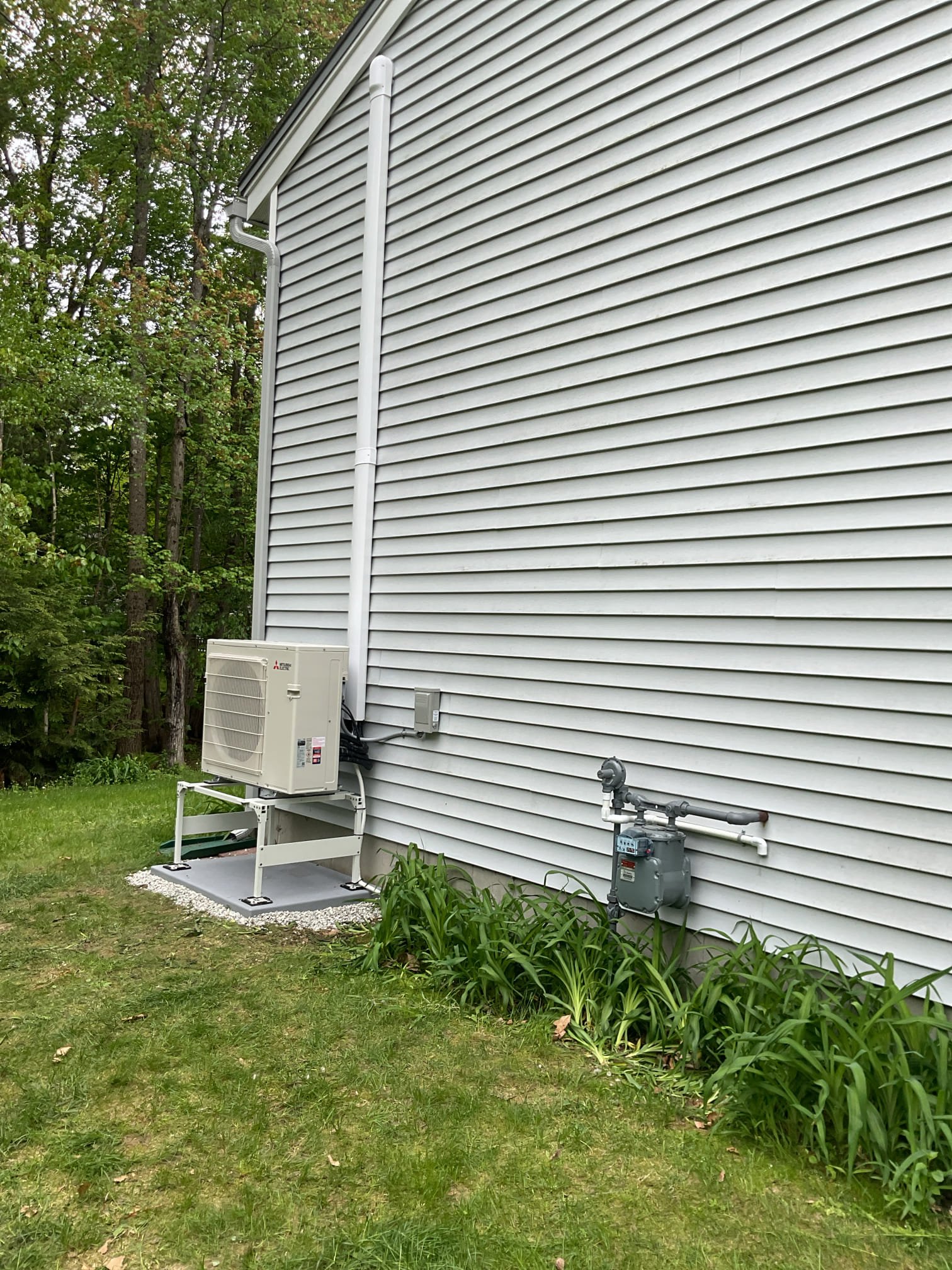 This proposal outlines the installation of a high-efficiency, multi-zone Mitsubishi ductless system designed primarily to provide excellent summer cooling and supplemental shoulder-season heating for your main living level.

Future-Proofing Your Home: As we discussed, we are intentionally sizing the new multi-zone outdoor condenser with extra capacity. This ensures that when you are ready to condition your basement space (near the electrical panel), we can simply return and add a 6,000 BTU indoor head to this existing outdoor unit without needing to upgrade the core equipment.

Scope of Work

1. Outdoor Equipment & Placement

The Condenser: We will supply and set one (1) multi-zone Mitsubishi standard heat pump condenser (cooling-focused) on a new equipment pad.

Location: The unit will be placed on the gable end of the home near the gas meter. We will carefully measure and install the unit to ensure it maintains all strict, code-required clearance distances from the gas utility equipm