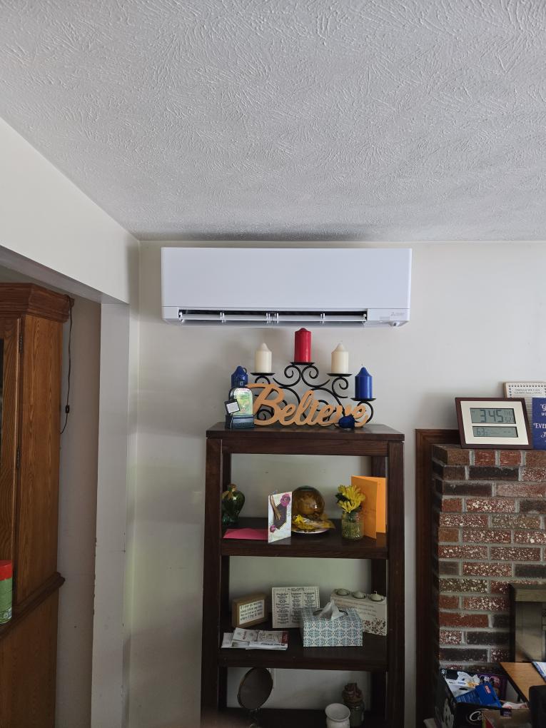 This proposal outlines the installation of a high-efficiency, multi-zone Mitsubishi ductless system designed primarily to provide excellent summer cooling and supplemental shoulder-season heating for your main living level.

Future-Proofing Your Home: As we discussed, we are intentionally sizing the new multi-zone outdoor condenser with extra capacity. This ensures that when you are ready to condition your basement space (near the electrical panel), we can simply return and add a 6,000 BTU indoor head to this existing outdoor unit without needing to upgrade the core equipment.

Scope of Work

1. Outdoor Equipment & Placement

The Condenser: We will supply and set one (1) multi-zone Mitsubishi standard heat pump condenser (cooling-focused) on a new equipment pad.

Location: The unit will be placed on the gable end of the home near the gas meter. We will carefully measure and install the unit to ensure it maintains all strict, code-required clearance distances from the gas utility equipm