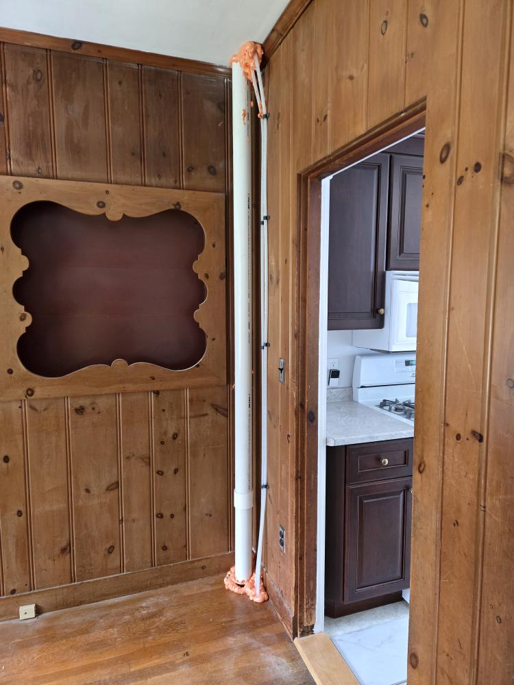 This proposal outlines the professional replacement of a compromised section of the home's main sanitary drainage system. We will be removing a significantly cracked cast iron waste line that runs from the basement up to the second floor. In addition to replacing the damaged pipe with modern PVC, we will engineer the new drainage stack to support the future addition of a third-floor bathroom.

Scope of Work

1. Wall Access & Demolition

First Floor Access: Carefully cut open the necessary access points within the first-floor wall cavity to expose the concealed, cracked cast iron waste line.

Extraction: Safely cut out and remove the compromised cast iron pipe running from the second-floor bathroom drop down into the basement.

Disposal of all removed cast iron pipe and job-related debris is included.

2. New PVC Stack Installation & Future-Proofing

Pipe Replacement: Supply and install a new, code-compliant PVC sanitary waste stack inside the wall cavity, running from the second floor 