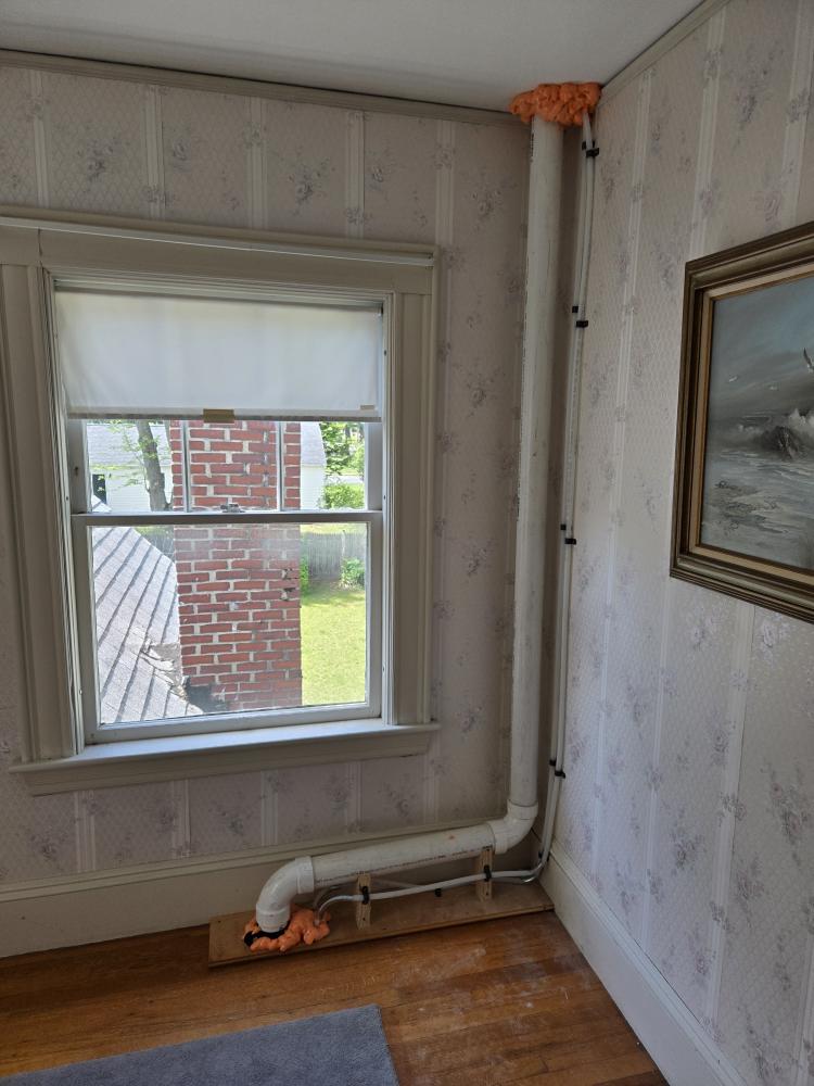 This proposal outlines the professional replacement of a compromised section of the home's main sanitary drainage system. We will be removing a significantly cracked cast iron waste line that runs from the basement up to the second floor. In addition to replacing the damaged pipe with modern PVC, we will engineer the new drainage stack to support the future addition of a third-floor bathroom.

Scope of Work

1. Wall Access & Demolition

First Floor Access: Carefully cut open the necessary access points within the first-floor wall cavity to expose the concealed, cracked cast iron waste line.

Extraction: Safely cut out and remove the compromised cast iron pipe running from the second-floor bathroom drop down into the basement.

Disposal of all removed cast iron pipe and job-related debris is included.

2. New PVC Stack Installation & Future-Proofing

Pipe Replacement: Supply and install a new, code-compliant PVC sanitary waste stack inside the wall cavity, running from the second floor 