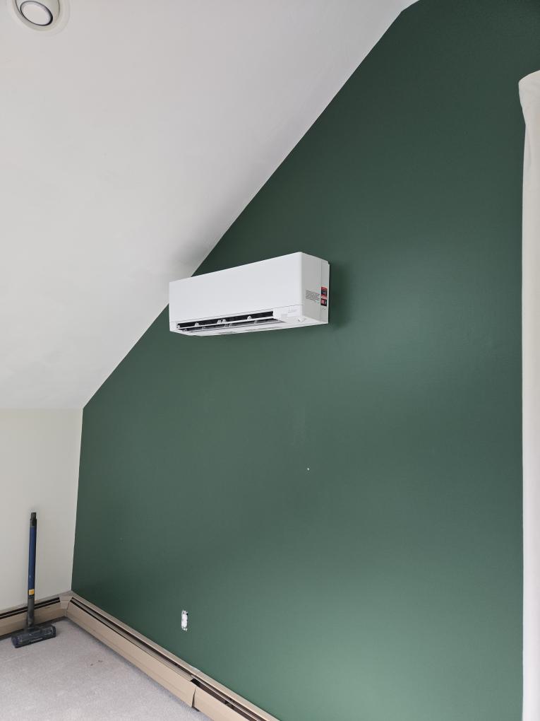 Installation of two separate multi-zone ductless systems to provide cooling and supplemental heating to four primary areas of the home. I designed this "split" layout specifically to minimize the amount of visible refrigerant piping running along the exterior of your siding.

System 1 (Left of Garage): This outdoor unit will be located on the street side of the home, to the left of the garage. This area is already level and ready for our equipment. It will serve:

The Reading Room (Upstairs): A wall-mounted unit.

The Kitchen (Main Floor): A wall-mounted unit directly below the Reading Room.

By grouping these two rooms onto their own outdoor unit, we can run the lines vertically and keep the installation very compact.


System 2 (Back Corner): This outdoor unit will be located at the back corner of the home. It will serve:

The Master Bedroom (Upstairs): A wall-mounted unit.

The Living Room (Main Floor): A wall-mounted unit directly below the Master.

Important Site Work: Please note