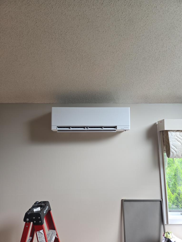 Installation of two separate multi-zone ductless systems to provide cooling and supplemental heating to four primary areas of the home. I designed this "split" layout specifically to minimize the amount of visible refrigerant piping running along the exterior of your siding.

System 1 (Left of Garage): This outdoor unit will be located on the street side of the home, to the left of the garage. This area is already level and ready for our equipment. It will serve:

The Reading Room (Upstairs): A wall-mounted unit.

The Kitchen (Main Floor): A wall-mounted unit directly below the Reading Room.

By grouping these two rooms onto their own outdoor unit, we can run the lines vertically and keep the installation very compact.


System 2 (Back Corner): This outdoor unit will be located at the back corner of the home. It will serve:

The Master Bedroom (Upstairs): A wall-mounted unit.

The Living Room (Main Floor): A wall-mounted unit directly below the Master.

Important Site Work: Please note