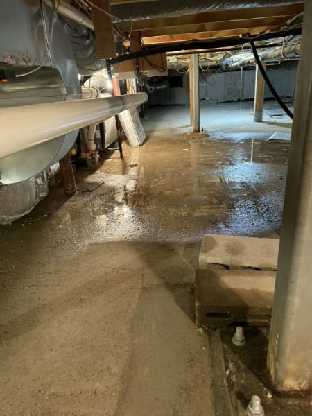 Found drain from water softener outside of drain pipe, pressure on back wash must have blow it out of the drain pipe.Install hangers on the drain line
