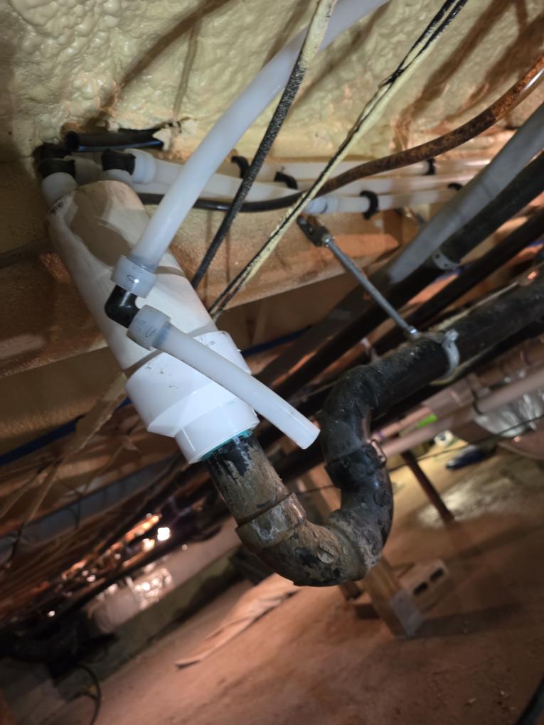 Found drain from water softener outside of drain pipe, pressure on back wash must have blow it out of the drain pipe.Install hangers on the drain line