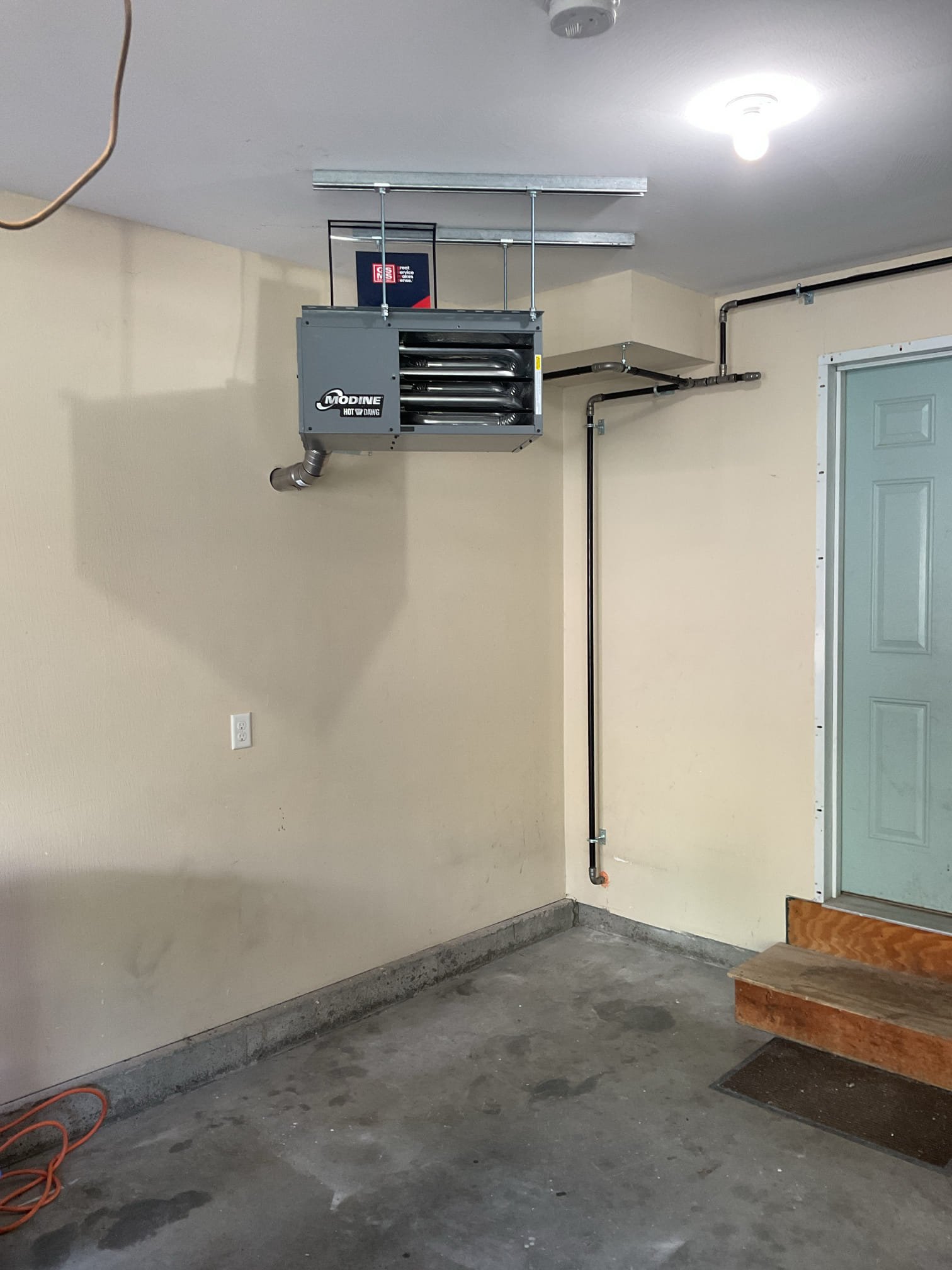 This project is designed to transform your garage into a comfortable, year-round workspace while proactively expanding your home's gas infrastructure for a future gas dryer.<br><br>For the heating system, we are proposing a premium Modine Sealed Combustion Unit Heater. Because garages often contain paints, chemicals, or gasoline fumes, a "sealed combustion" unit is the absolute safest choice. Instead of pulling air from inside the garage (which could ignite fumes), this unit pulls 100% fresh combustion air directly from the outside, keeping your garage completely safe and up to code.<br><br>Scope of Work<br><br>1. Unit Heater Installation & Venting<br><br>Equipment: We will supply and install a new Modine Sealed Combustion Unit Heater.<br><br>Placement: The unit will be securely suspended from the ceiling using heavy-duty threaded rod, positioned along the back side wall exactly as specified in your provided drawing.<br><br>Venting: We will install new, code-compliant horizontal ventin