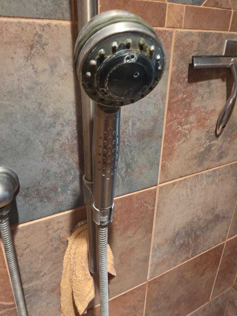 Replace laundry sink and faucet in garage 