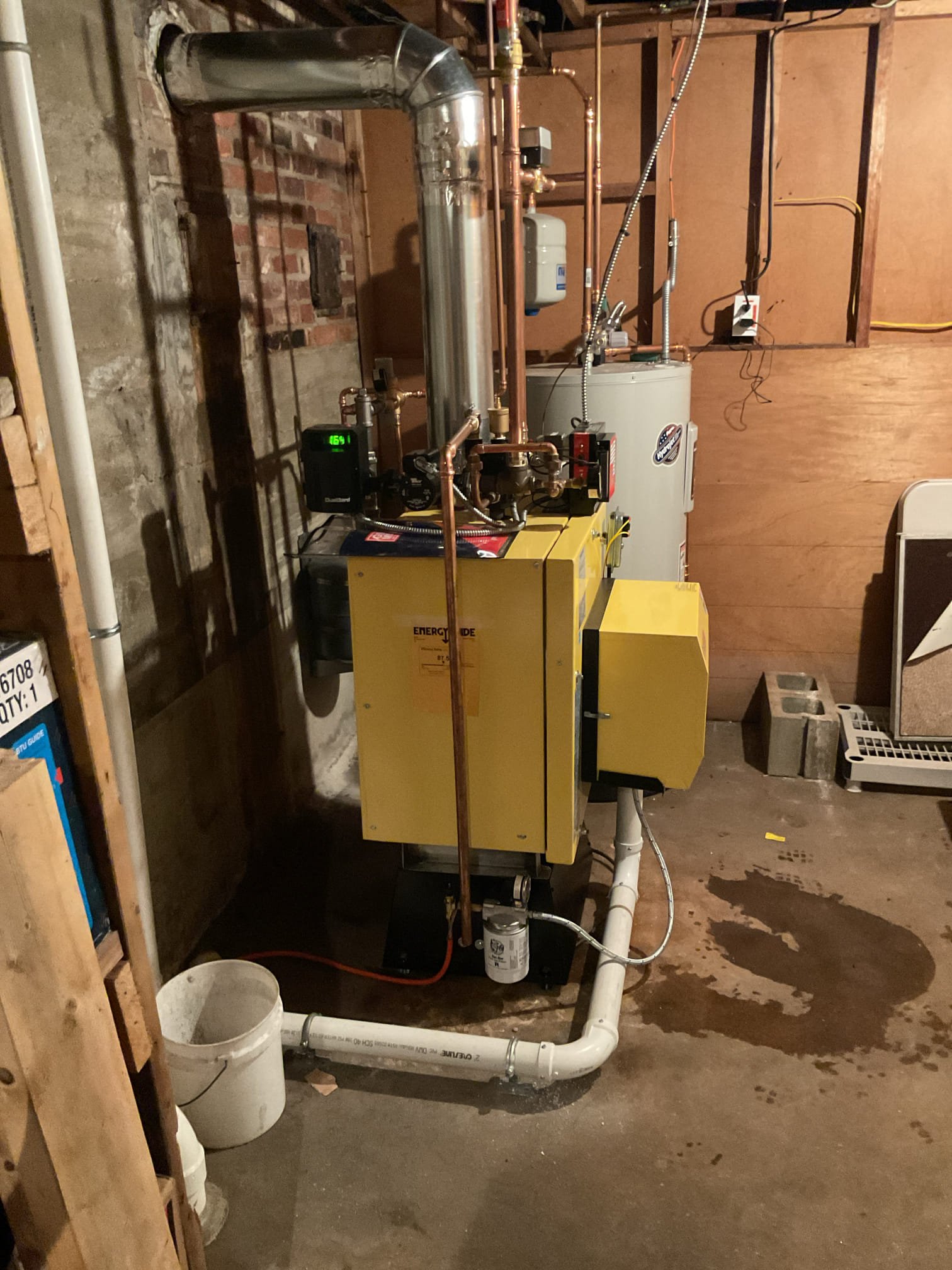 With your current oil boiler requiring more frequent service, this proposal outlines a premium, high-efficiency upgrade path to give you ultimate peace of mind and significantly lower your annual heating costs.

Instead of installing another heavy, standard cast iron boiler that wastes energy keeping itself hot in the mechanical room, we will upgrade your home to the Energy Kinetics System 2000. This advanced system utilizes a low-mass, spiral heat exchanger that rapidly transfers heat directly to your home. While this proposal configures the system for single-zone "heat only", it will still drastically cut down your annual fuel consumption while providing exceptionally quiet operation.

Scope of Work

1. Demolition & System Decommissioning

Extraction: We will safely drain the existing system, disconnect all ties, and remove the aging boiler.

Near-Boiler Re-piping: We will completely remove all the old near-boiler piping, aging valves, and old circulator pump. We will rebuild the ent