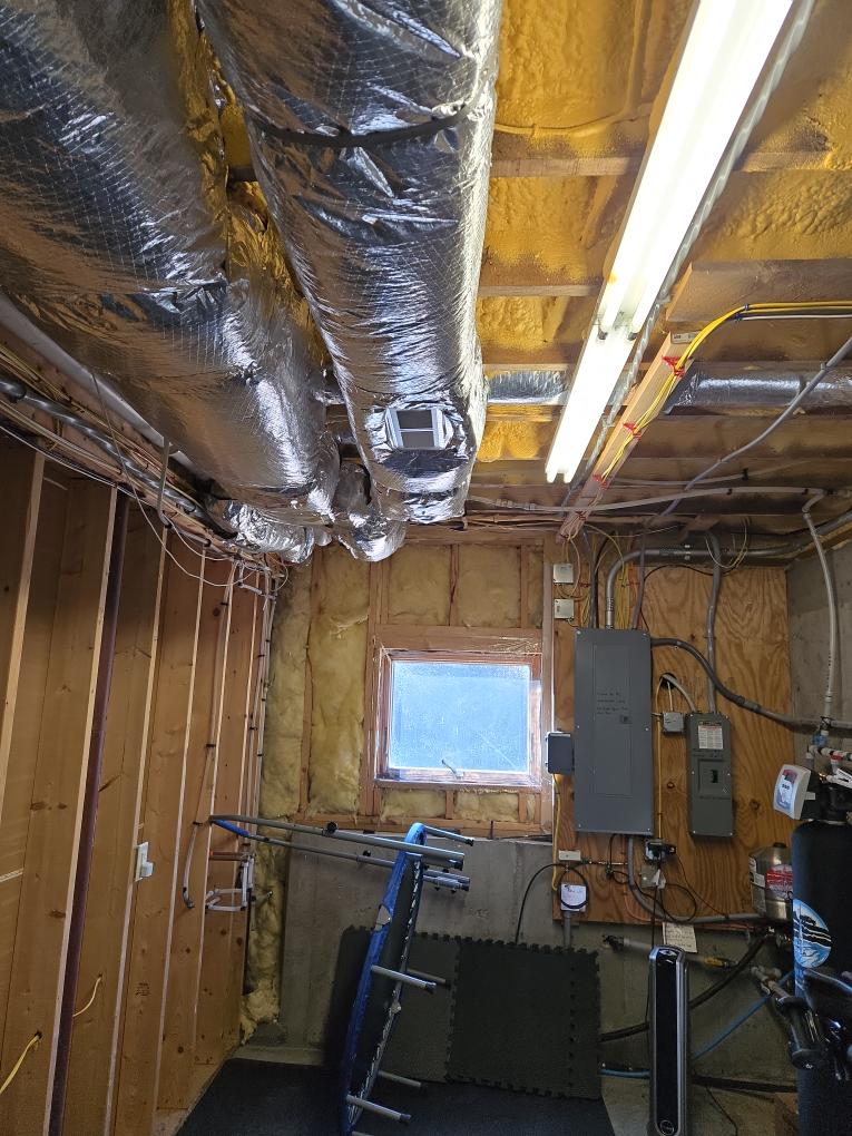 This proposal outlines a highly cost-effective solution to introduce heating and cooling into your basement workout room.

As we discussed, creating a "true" independent heating zone for this space using your newly installed Lennox system is not feasible. The workout room is not large enough to handle the minimum required airflow for the main furnace; attempting to restrict the airflow to just that room would cause high static pressure and permanently damage your new Lennox equipment.

While the ultimate solution for independent comfort would be a dedicated single-zone ductless mini-split (typically a $6,000–$7,000 investment), we have designed an alternative approach. By tapping directly into the existing ductwork that runs through the ceiling of the workout room, we can provide excellent supplemental comfort to the space whenever the main house is calling for heating or cooling.

Scope of Work

1. Ductwork Modifications & Register Installation

Direct Trunk Taps: Our team will carefu