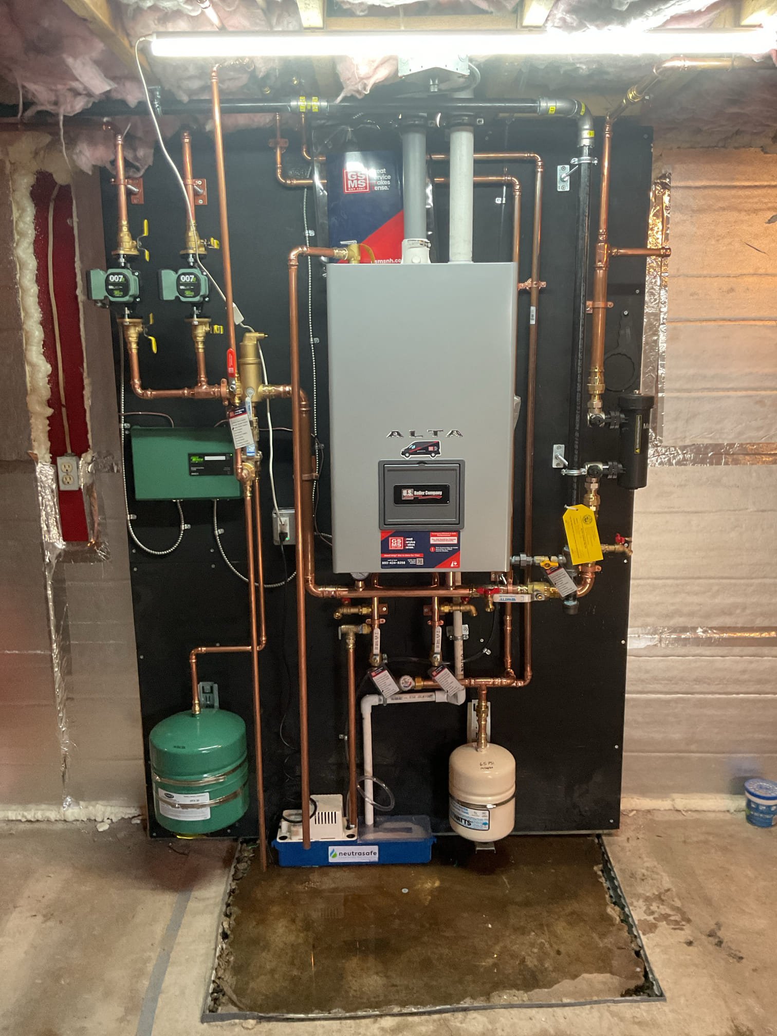First, I want to commend you both on the incredible work you are doing remodeling your home! Pairing your recent NH Saves insulation work, working on new windows, and with a completely modernized HVAC system is the smartest way to maximize your home's efficiency and comfort.

This proposal outlines the complete removal of your aging oil boiler and hydro-air system. In its place, we will install a brand-new, high-efficiency natural gas Combi Boiler to handle your baseboard heating and domestic hot water. For the addition and the front of the home, we will install a premium 2-Zone Mitsubishi Hyper Heat system to provide top-tier summer air conditioning and highly reliable winter heating.

Scope of Work

1. Demolition & Equipment Removal

Boiler Removal: Because there is no bulkhead access, our team will safely break down the heavy cast-iron oil boiler into manageable sections to remove it from the basement.

Oil Tank Removal: We will coordinate with our specialized environmental subcontr