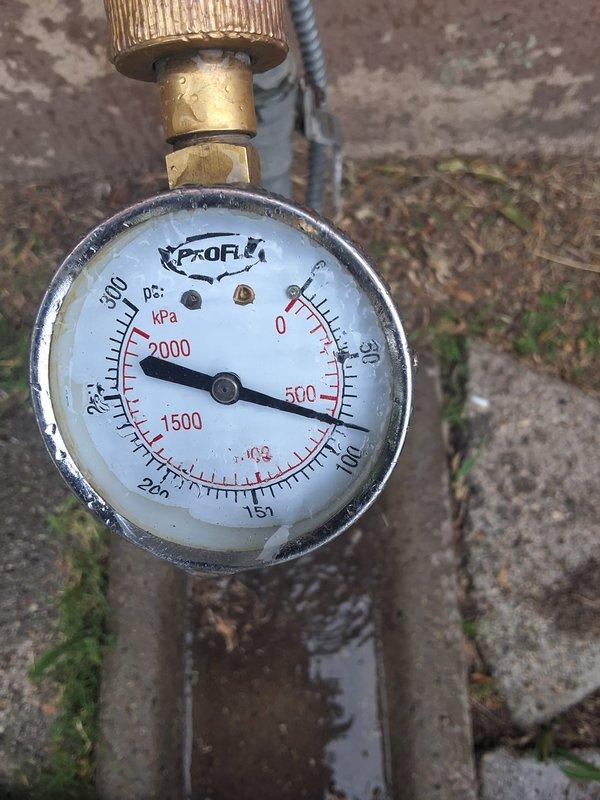 Replaced a 20-year-old 40-gallon gas water heater (Model M440T6FBN, Serial CB7342196) that was actively leaking. Removed the old unit from the utility closet, which showed significant deterioration with rust stains, corrosion on the vent pipe, and accumulated debris. Installed new 40-gallon gas water heater with proper venting and connections, ensuring all pressure settings were within specifications as verified by gauge readings.