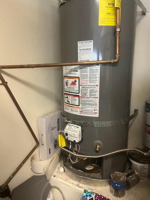 Performed inspection and estimate on existing 50-gallon gas water heater identified for replacement. Current unit is a Rheem Performance Platinum model showing age and wear, with original manufacturer specifications and serial number information unavailable. Evaluated installation location, existing copper supply line connections, gas valve assembly, temperature and pressure relief valve discharge piping, and drain pan configuration. Discussed replacement options with customer, presenting 50-gallon gas water heater as suitable replacement unit. Reviewed permit requirements for water heater replacement and confirmed customer understanding of permitting process. Provided detailed estimate for complete water heater replacement including removal and disposal of existing unit, installation of new 50-gallon gas water heater with code-compliant connections, and discussed available summer promotional pricing and payment options. Documented existing installation with photographs showing current