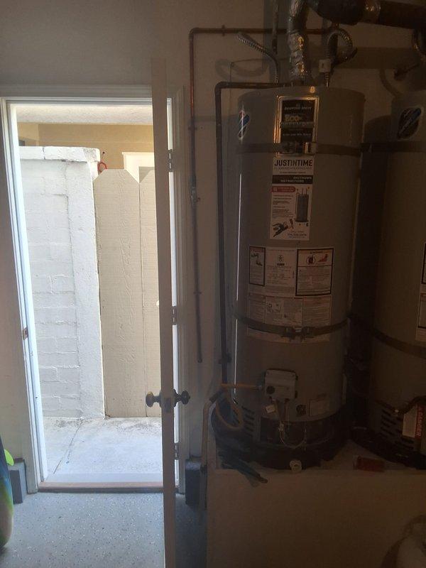 Responded to no hot water complaint on a 4-year-old 40-gallon Bradford White gas water heater, model URG240T6N. Performed diagnostic evaluation of the unit and documented existing installation conditions including venting, gas connections, and plumbing configuration. Provided assessment and repair options to restore hot water functionality.