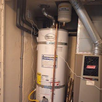 Replaced aging 2010 residential gas water heater (model U15036FRN) with new 50-gallon gas water heater in utility closet. Installation included proper venting with flexible ductwork, expansion tank mounting, gas line connections, and all required plumbing connections with copper and flexible supply lines. All safety valves, electrical connections, and code-compliant components were installed and tested for proper operation.